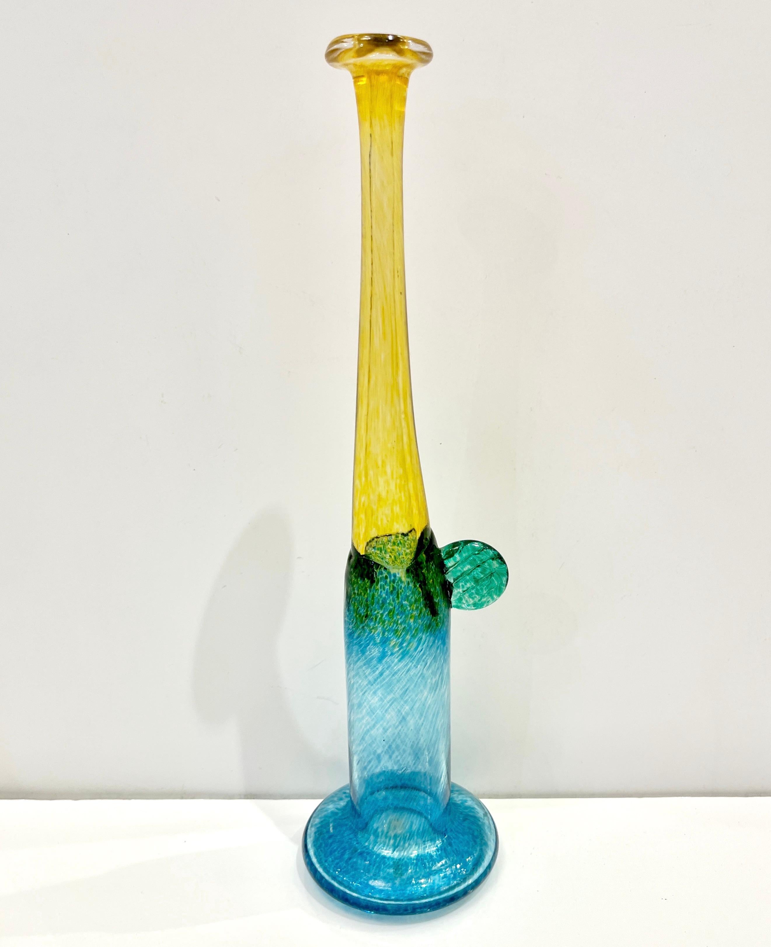 A fun and colored single-flower modern vase by Swedish glass master Bertil Vallien for Kosta Boda, limited Edition n.48on 75. Etched with the artist's signature and details under the base. This vase (that can be accompanied by a taller item