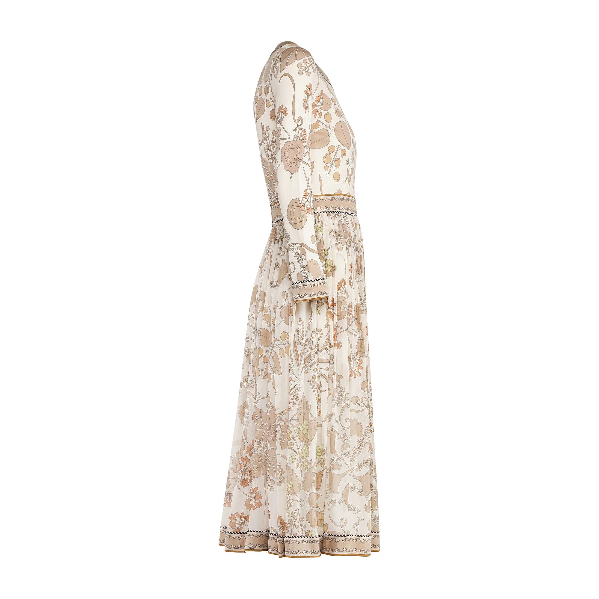 Made in Firenze, Italy, this patterned dress is by Italian fashion house Bessi. Founded by Italian tailor Averardo Bessi in 1950, the house became known for its playfully printed fabrics, much akin to Pucci with whom his designs are often
