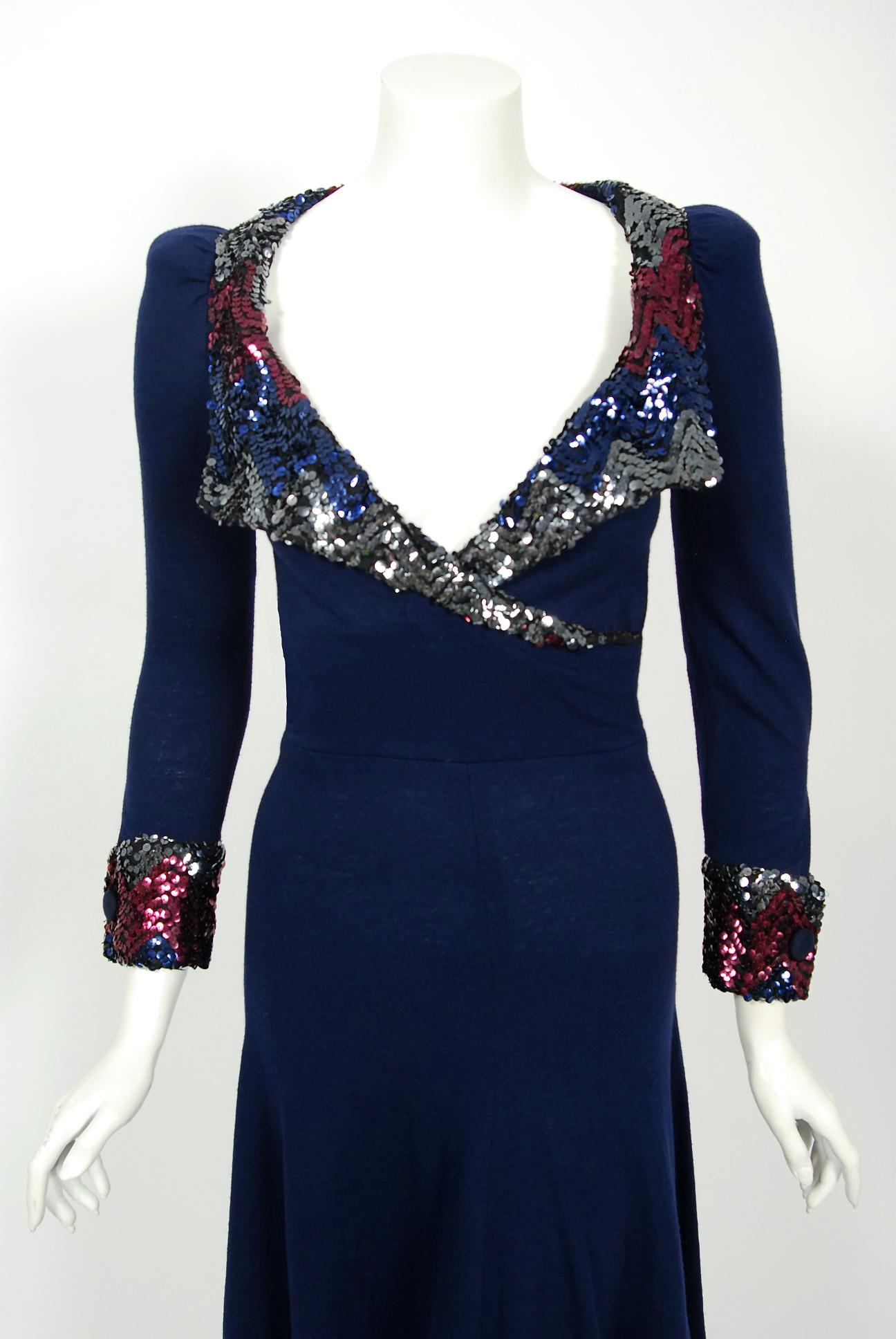 If you were an “It Girl” in London during the 1960's and 1970's, Biba is where you would have shopped. This sensational navy-blue swool dress, dating back to 1973, is a perfect example of the brand's genius. The fabric has a flattering stretch with
