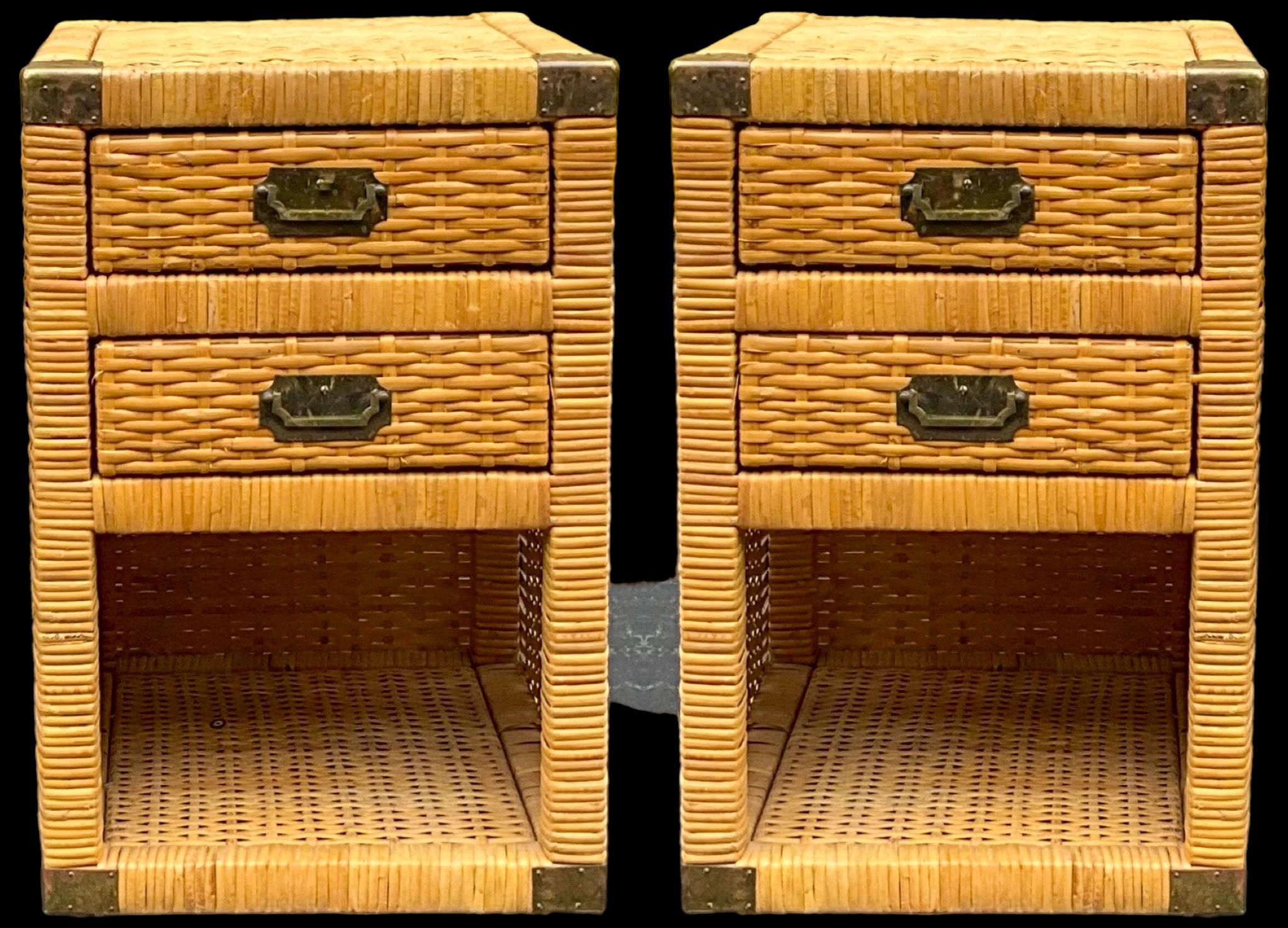 This is a pair of wicker side tables with campaign styling in the manner of the Bielecky Brothers of New York. They are a wonderful size! They have lite age wear and are unmarked. I do have the long dresser and lingerie chest if interested.

My