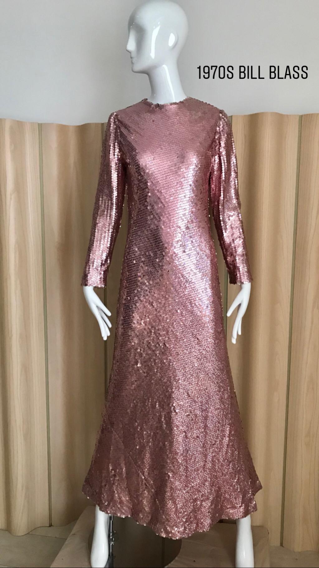 Vintage 70s Bill Blass Pink Metallic Sequin Long Sleeve gown. 
Zipper at the back. Some missing sequins but not significant.
Bust: 36 inches 
Size: SM-MED