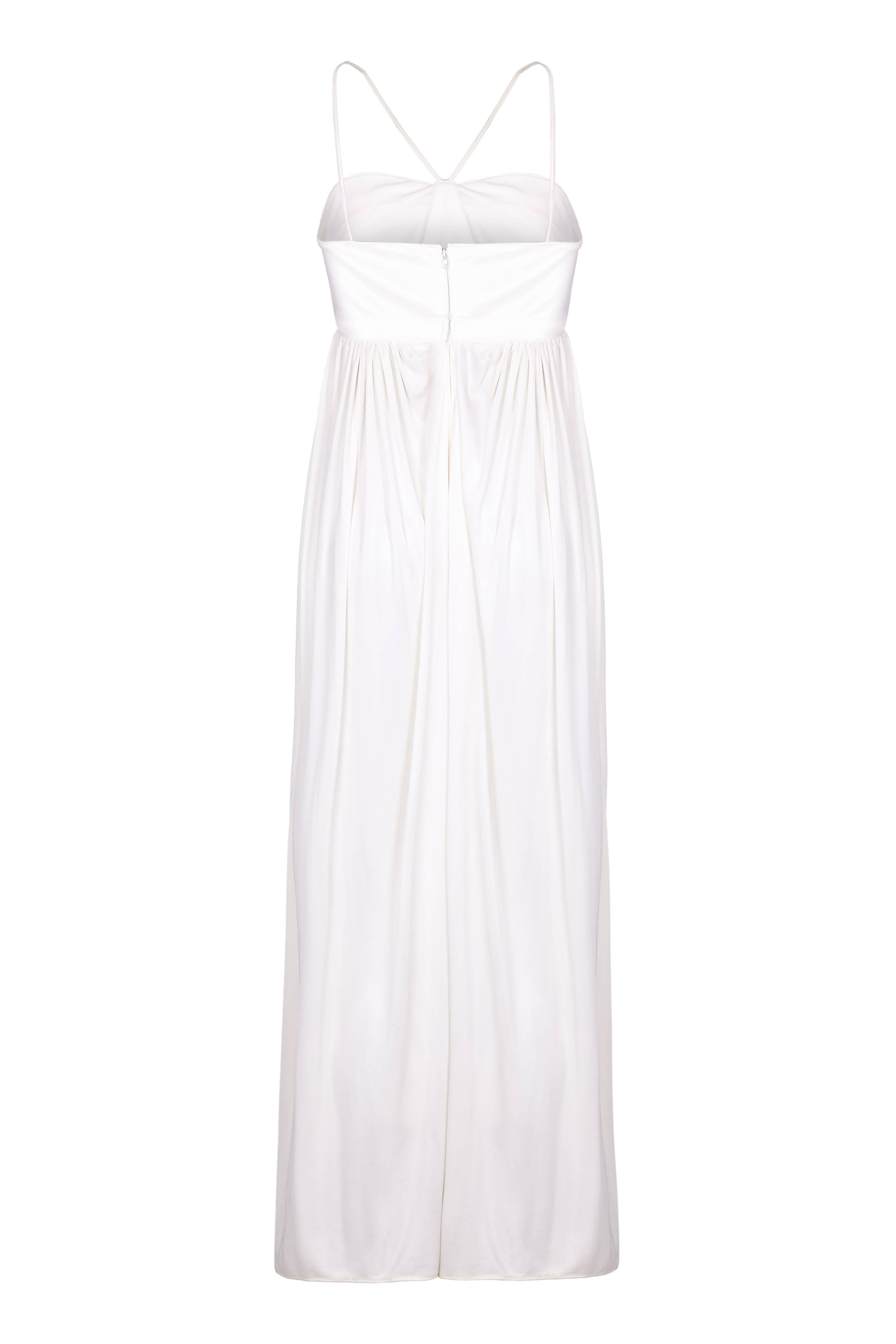 This enchanting vintage 1970s Bill Gibb silk jersey evening dress in soft white is in beautiful vintage condition and as the designer notoriously only made limited numbers of the same design, this is without doubt a rare piece (the original owner