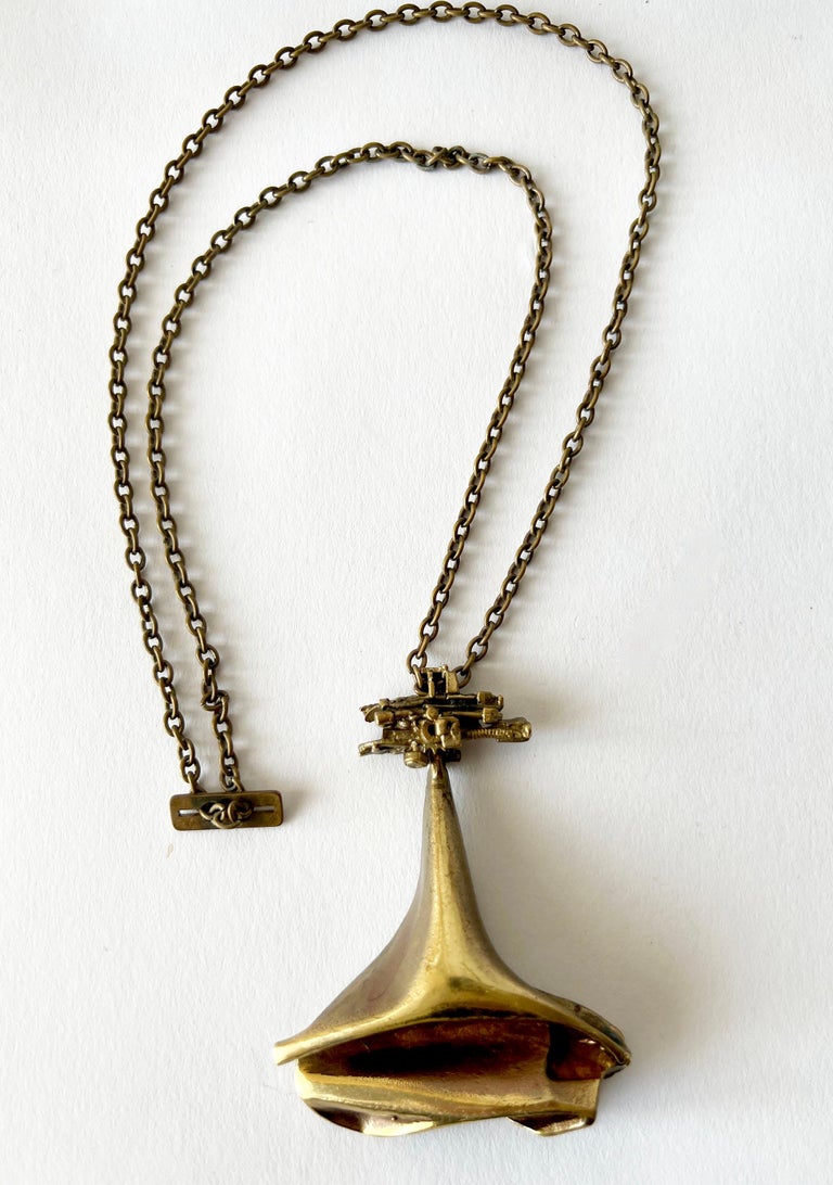 Large bronze pendant necklace and chain designed by Bjorn Weckstrom for Lapponia, Finland, 1970s.  The Flame Bronze series were inspired by America's auto industry, this particular necklace is titled 