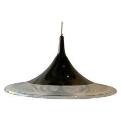 Apparecchio in plastica nera e trasparente degli anni '70