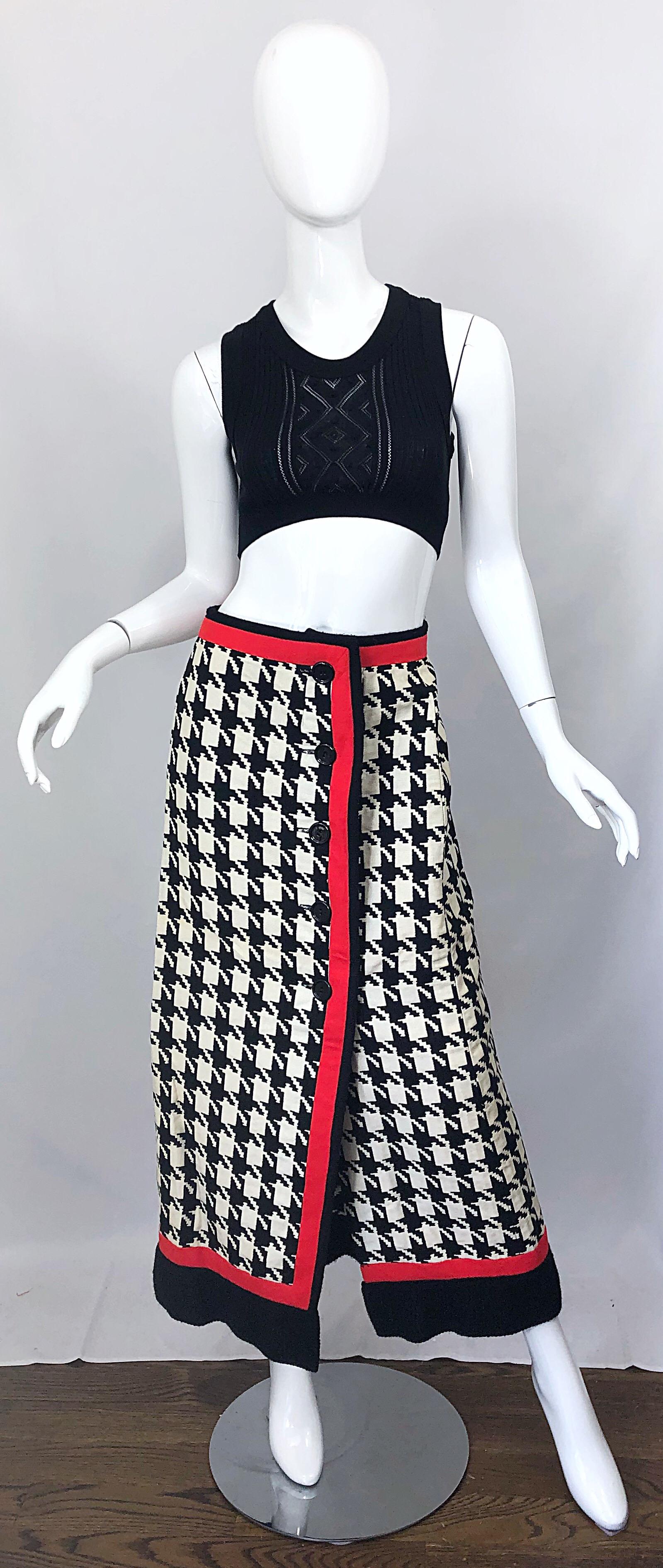Chic vintage 70s TINA S of the Sidneys black and white and red oversized houndstooth maxi skirt! Features a heavy cotton with red wool striped trims. Black buttons up the front of the skirt. 
The pictured 1990s Jean Paul Gaultier black crop top goes