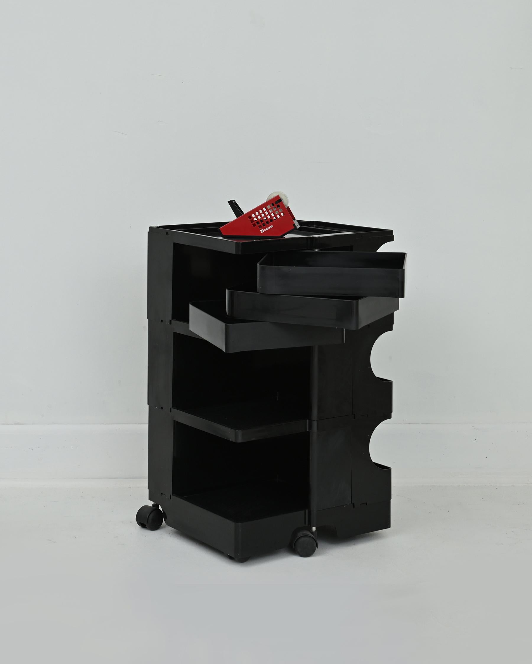 1970s black plastic Boby Trolly cart by Joe Colombo for Bieffeplast with 6 storage drawers. Made in Italy. Some small scuffs and dulling of the plastic. Signs of wear are consistent with age and use. Labeled and signed. The Boby Trolley is exhibited