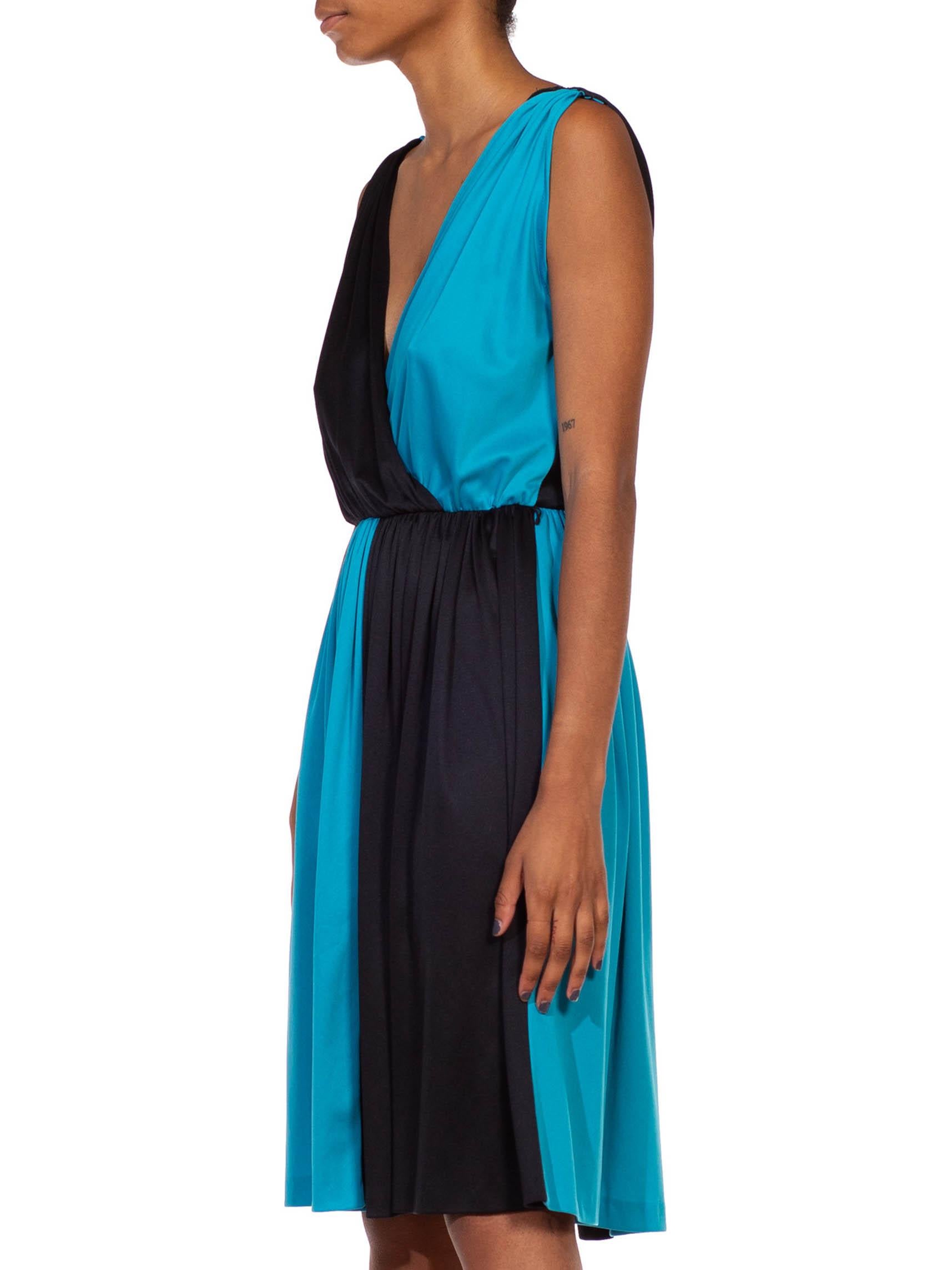 Women's 1970S Black & Cyan Blue Polyester Asymmetrical Color Blocked Cocktail Dress For Sale