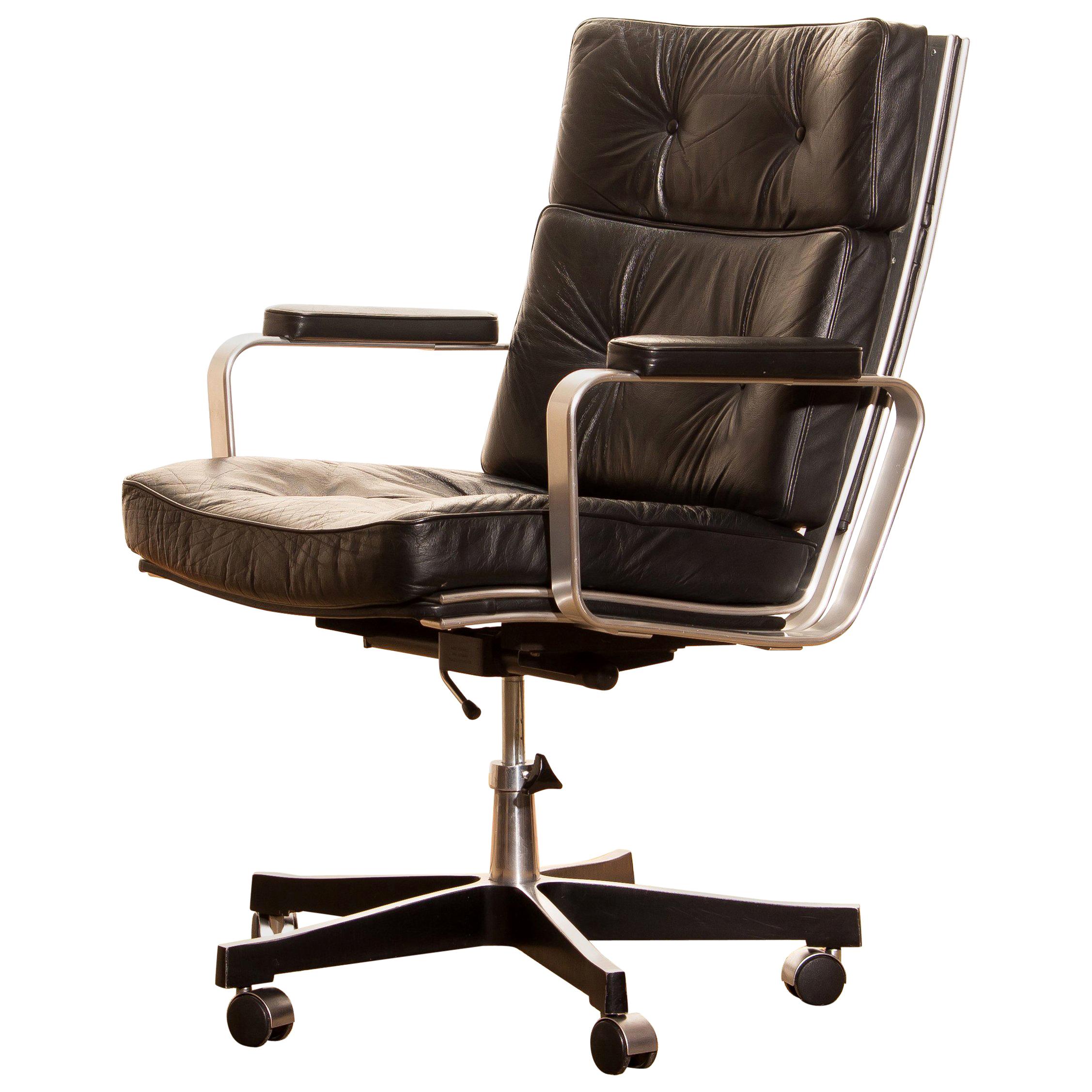 Beautiful adjustable office chair designed by Karl Erik Ekselius for JOC Design.
The nice thick solid black leather with an aluminum frame on wheels all in good condition.
The chair is extremely comfortable and newly filed.
Period: