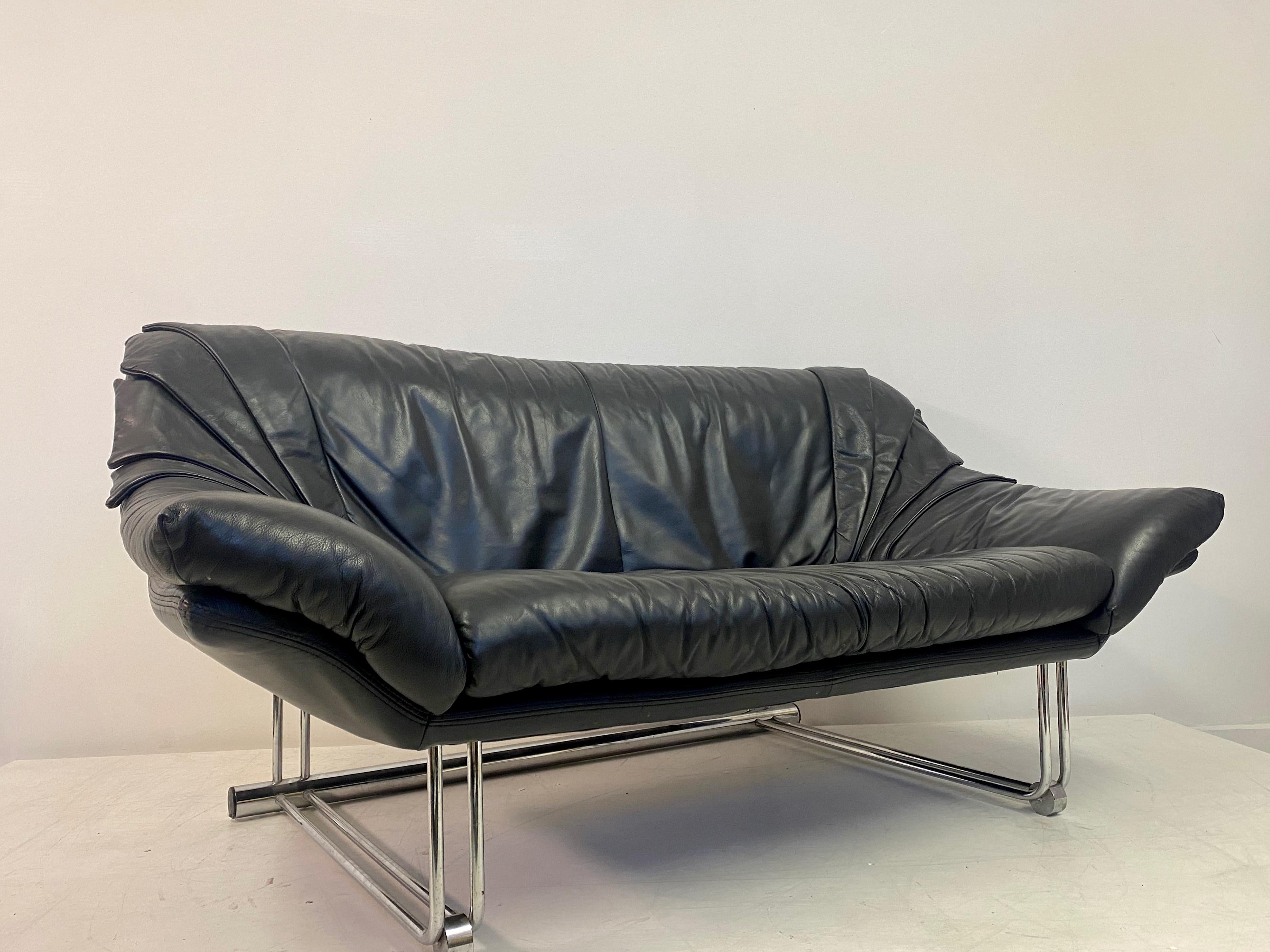 Italian 1970s Black Leather And Chrome Two Seater Sofa Two Available