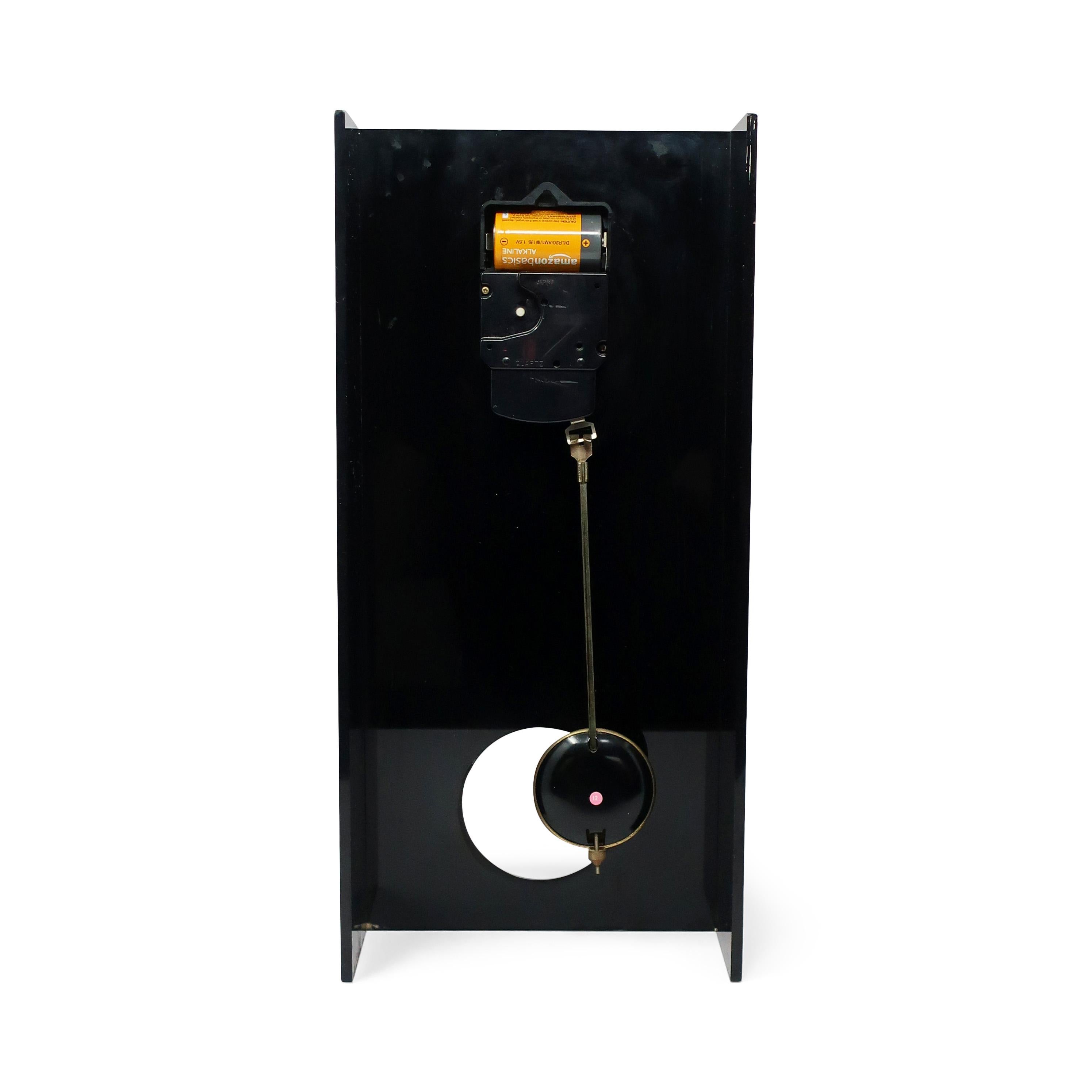 Metal 1970s Black Lucite Pendulum Clock