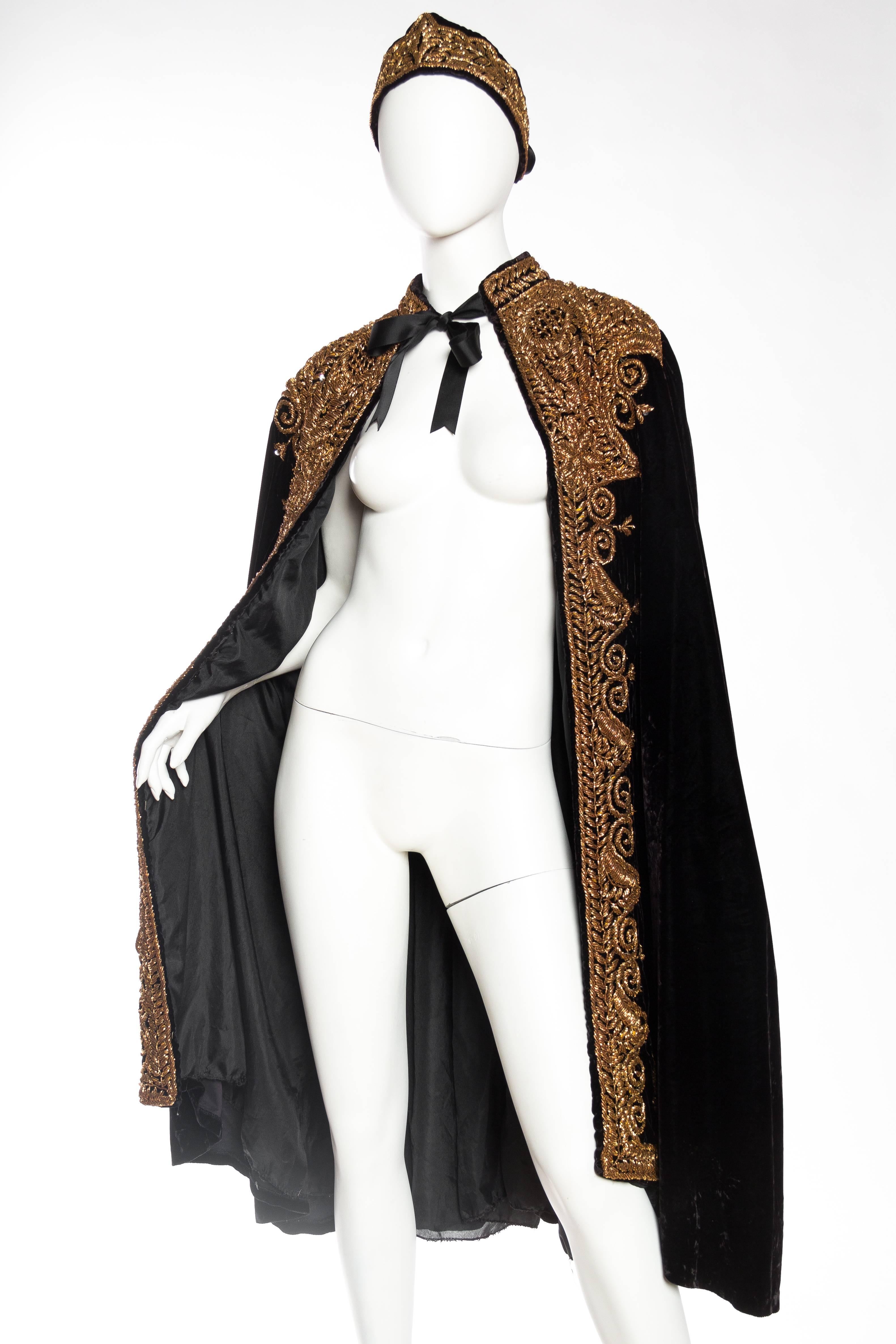 Worn by Marilyn Manson in King Kong Magazine. Has matching headpiece/belt 1970S Black Rayon Velvet Cape With Dramatic Real Copper Hand Embroidery