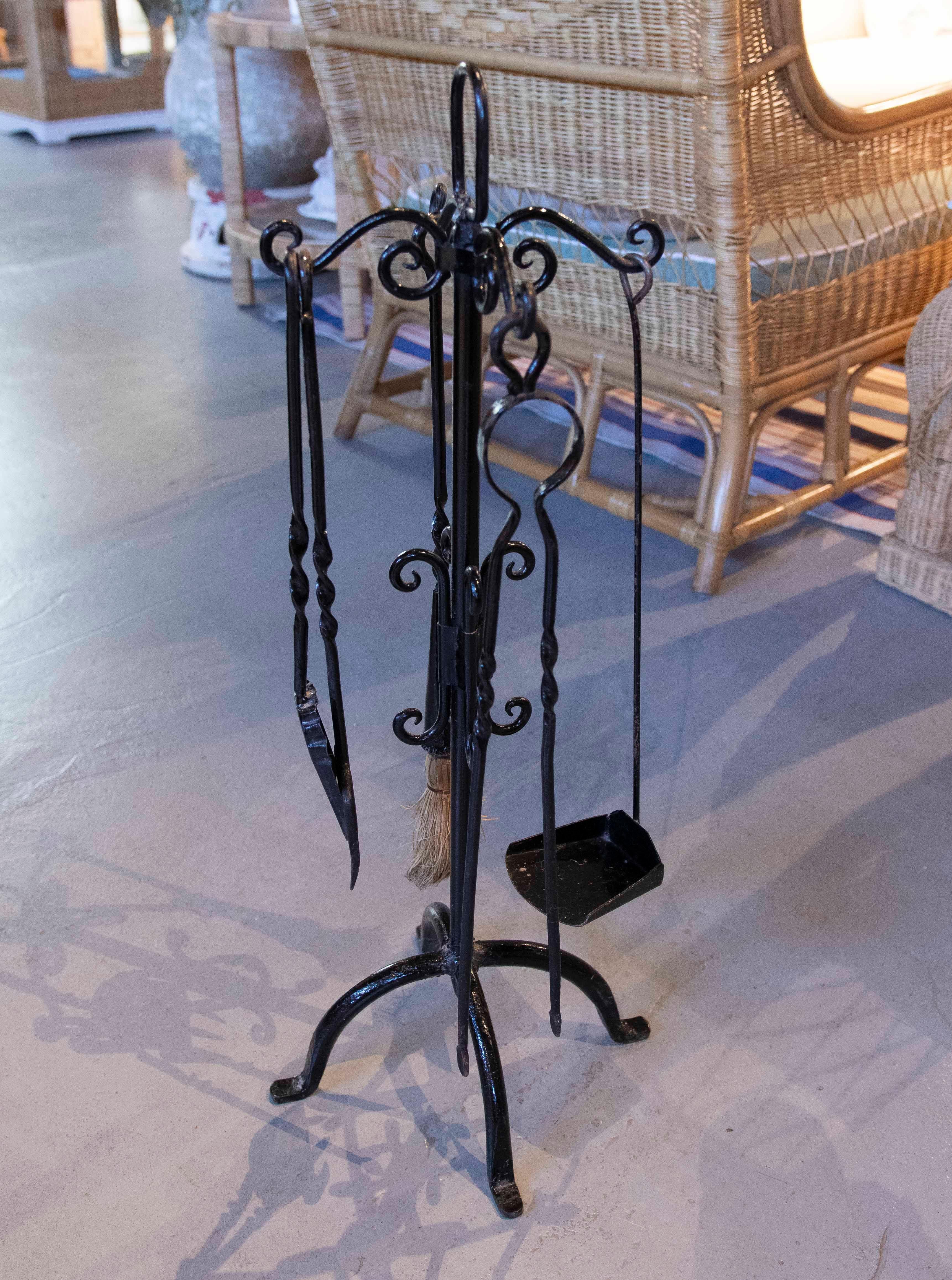 Spanish 1970s Black Wrought Iron Fireplace Tool Set with Decorative Stand For Sale