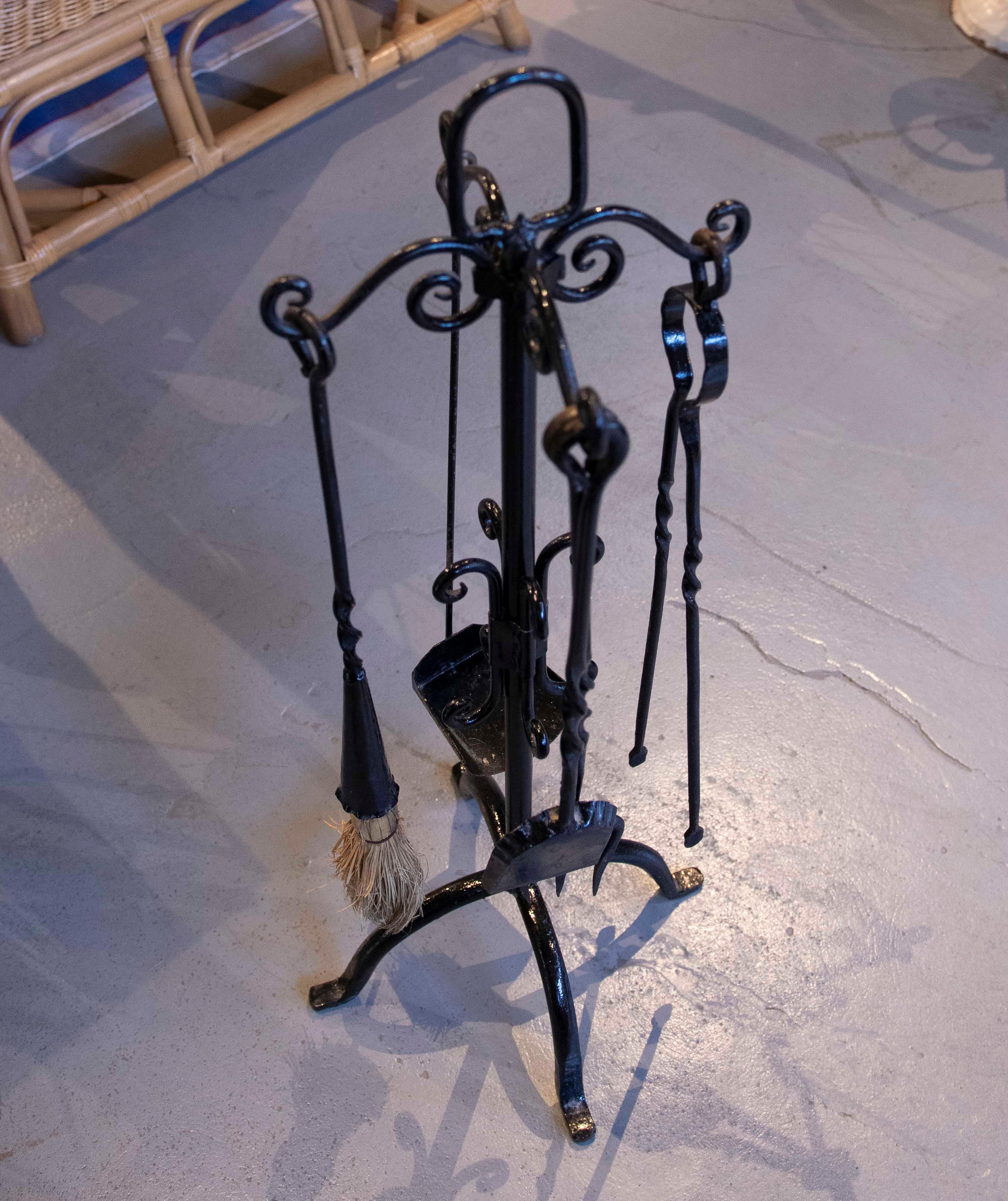 1970s Black Wrought Iron Fireplace Tool Set with Decorative Stand For Sale 1