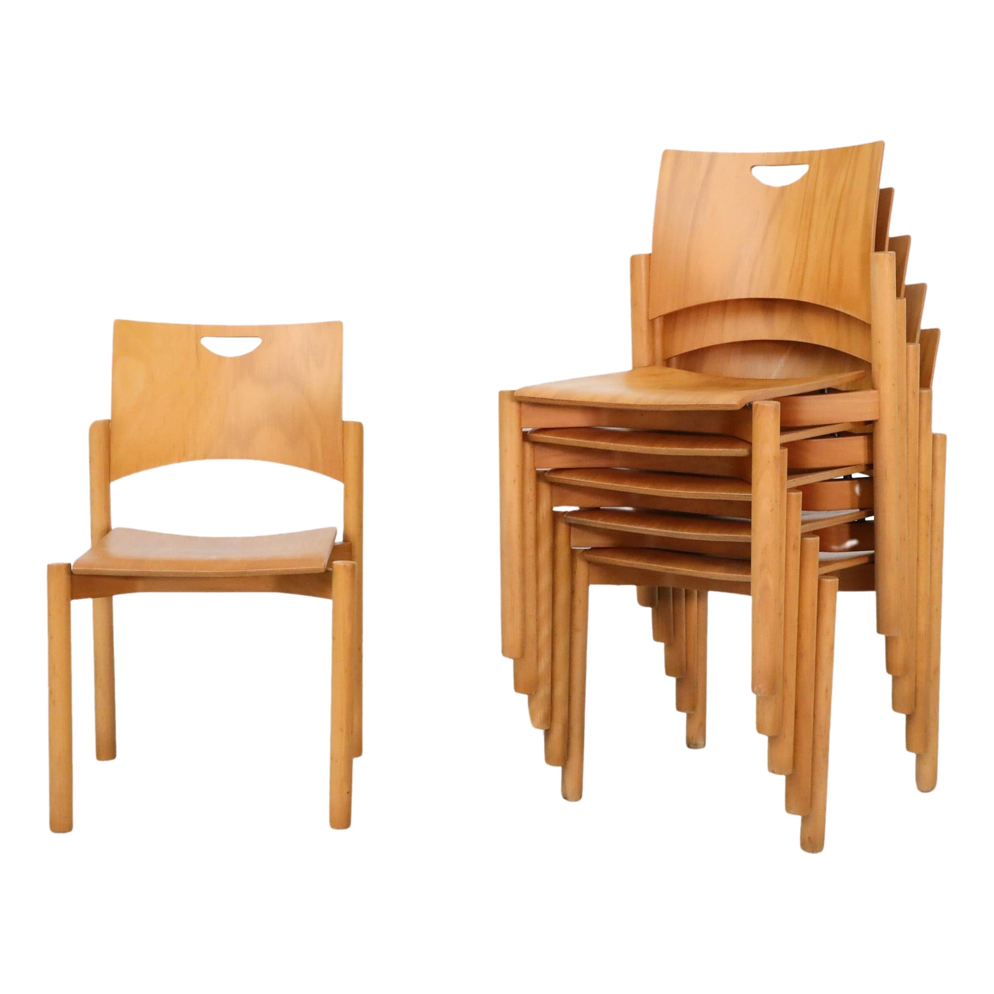 1970
s Blonde Plywood Stacking Dining Chairs with Cut Out Handles by Casala