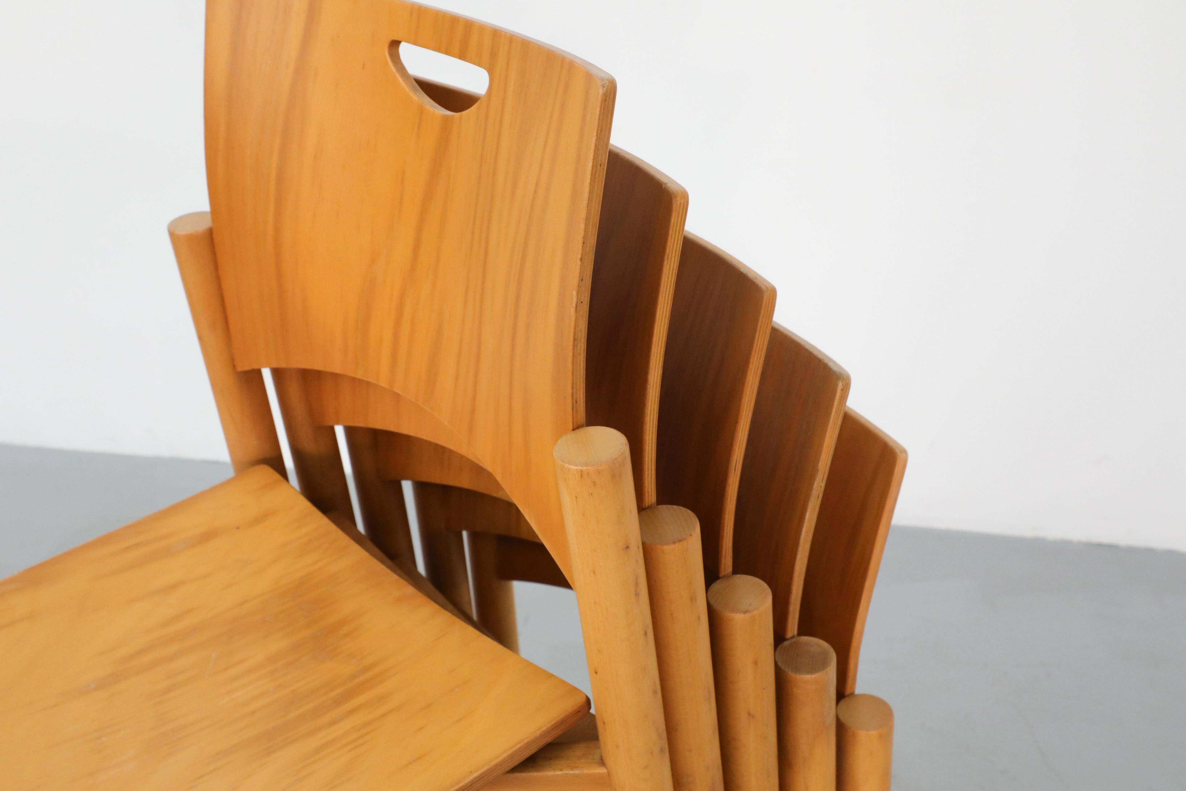 1970's Blonde Plywood Stacking Dining Chairs with Cut Out Handles by Casala 7