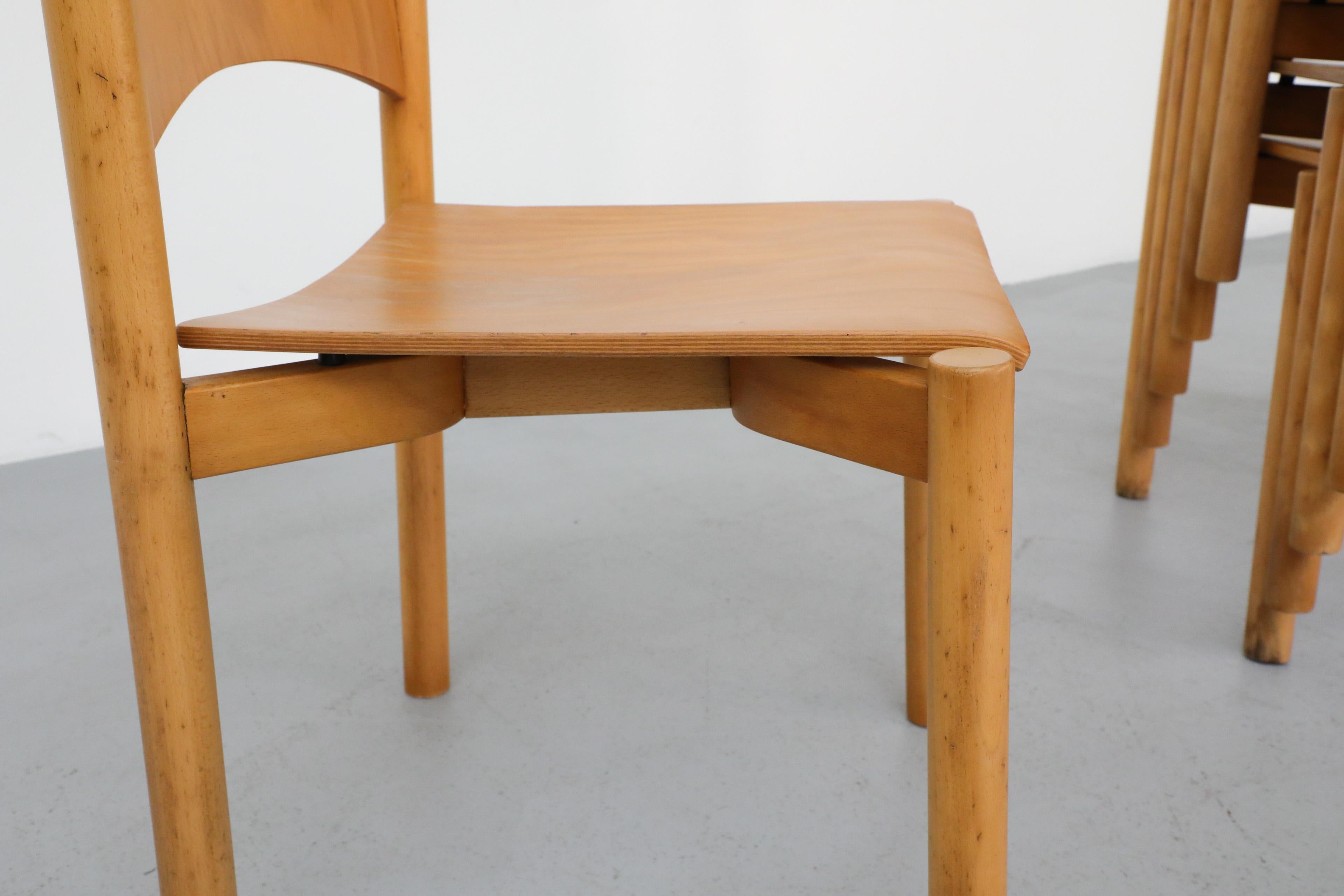 1970's Blonde Plywood Stacking Dining Chairs with Cut Out Handles by Casala 10