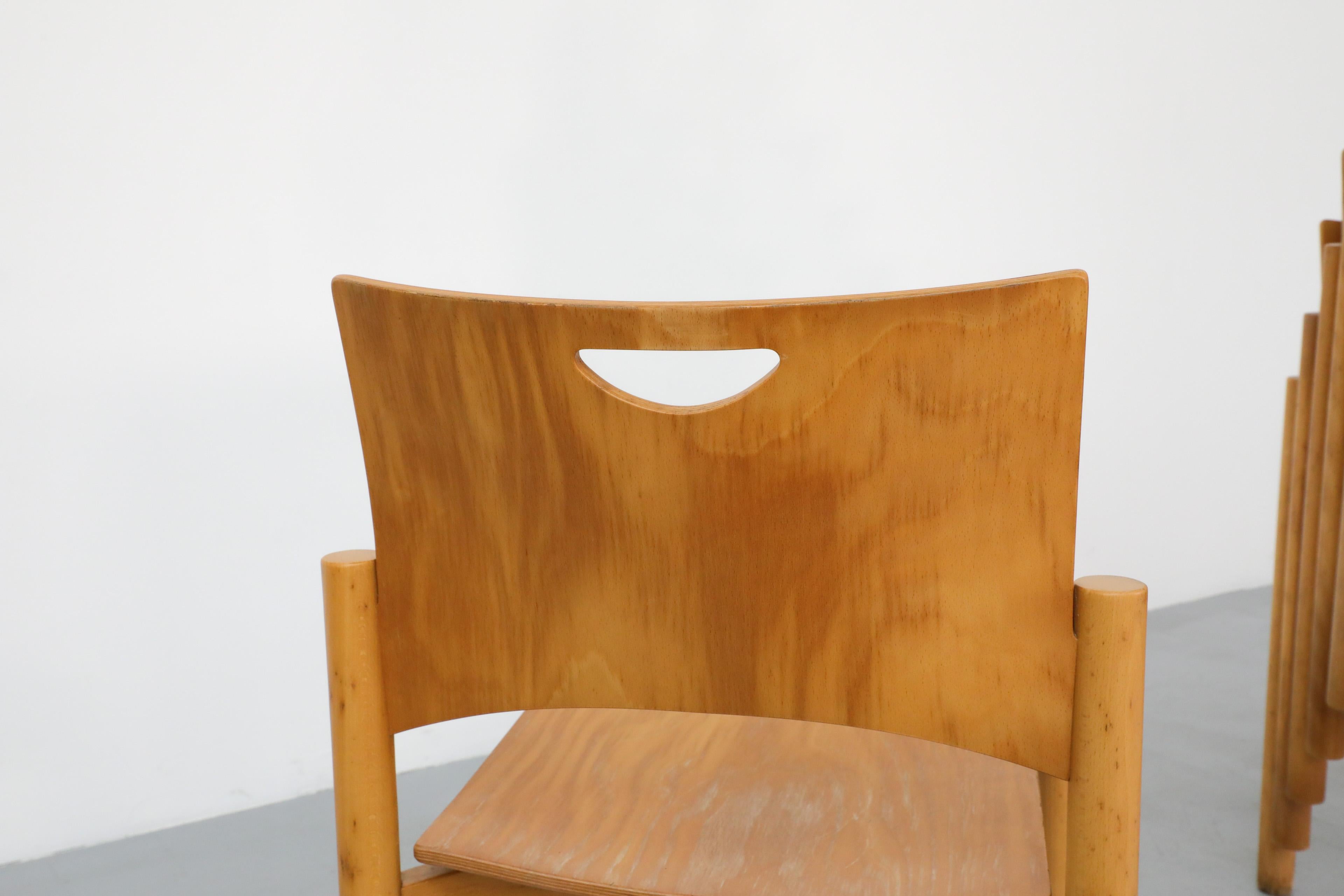 1970's Blonde Plywood Stacking Dining Chairs with Cut Out Handles by Casala 11