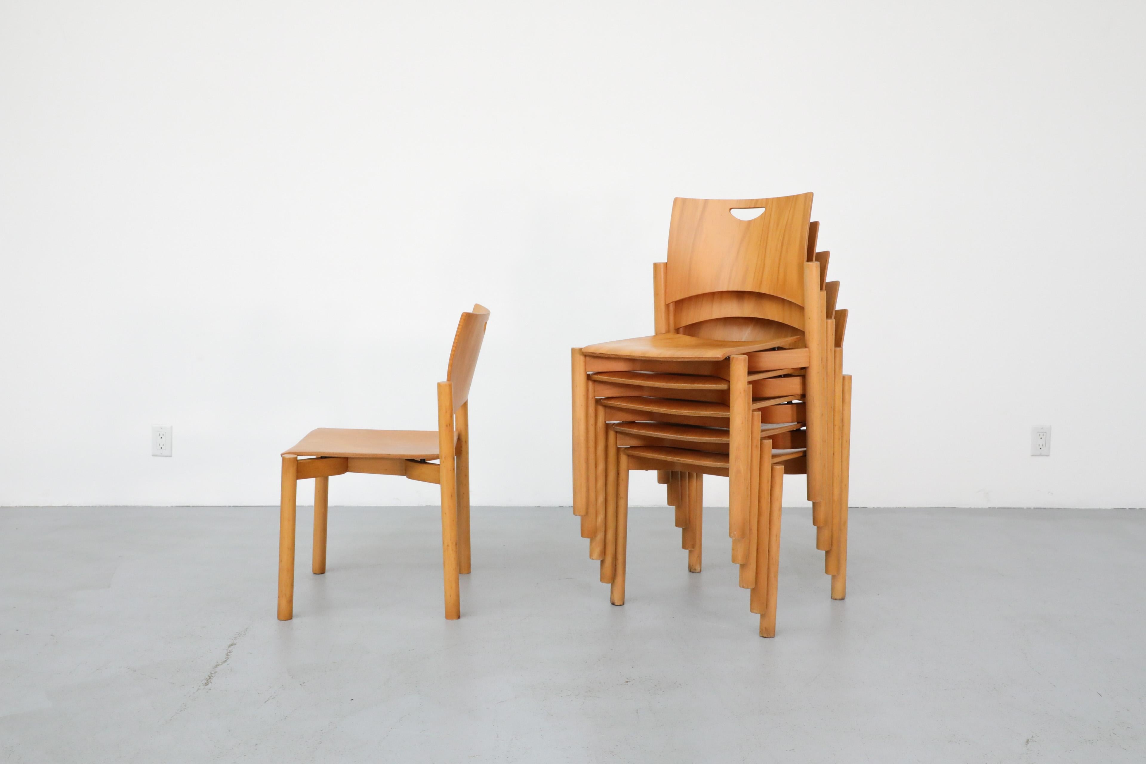 Late 20th Century 1970's Blonde Plywood Stacking Dining Chairs with Cut Out Handles by Casala