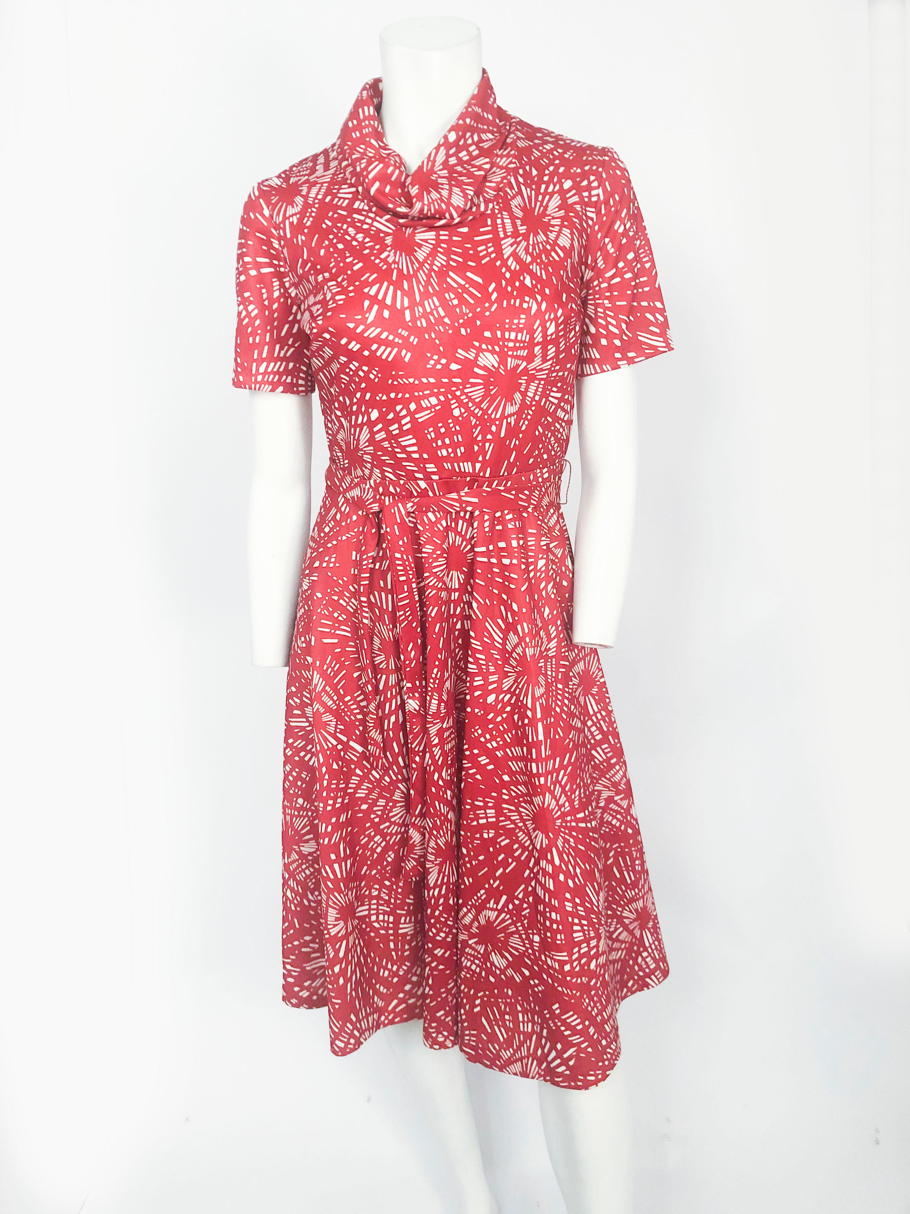Blood Orange and white printed dress with fragmented print, short sleeves, midi length, matching sash and featuring an oversized draped turtleneck