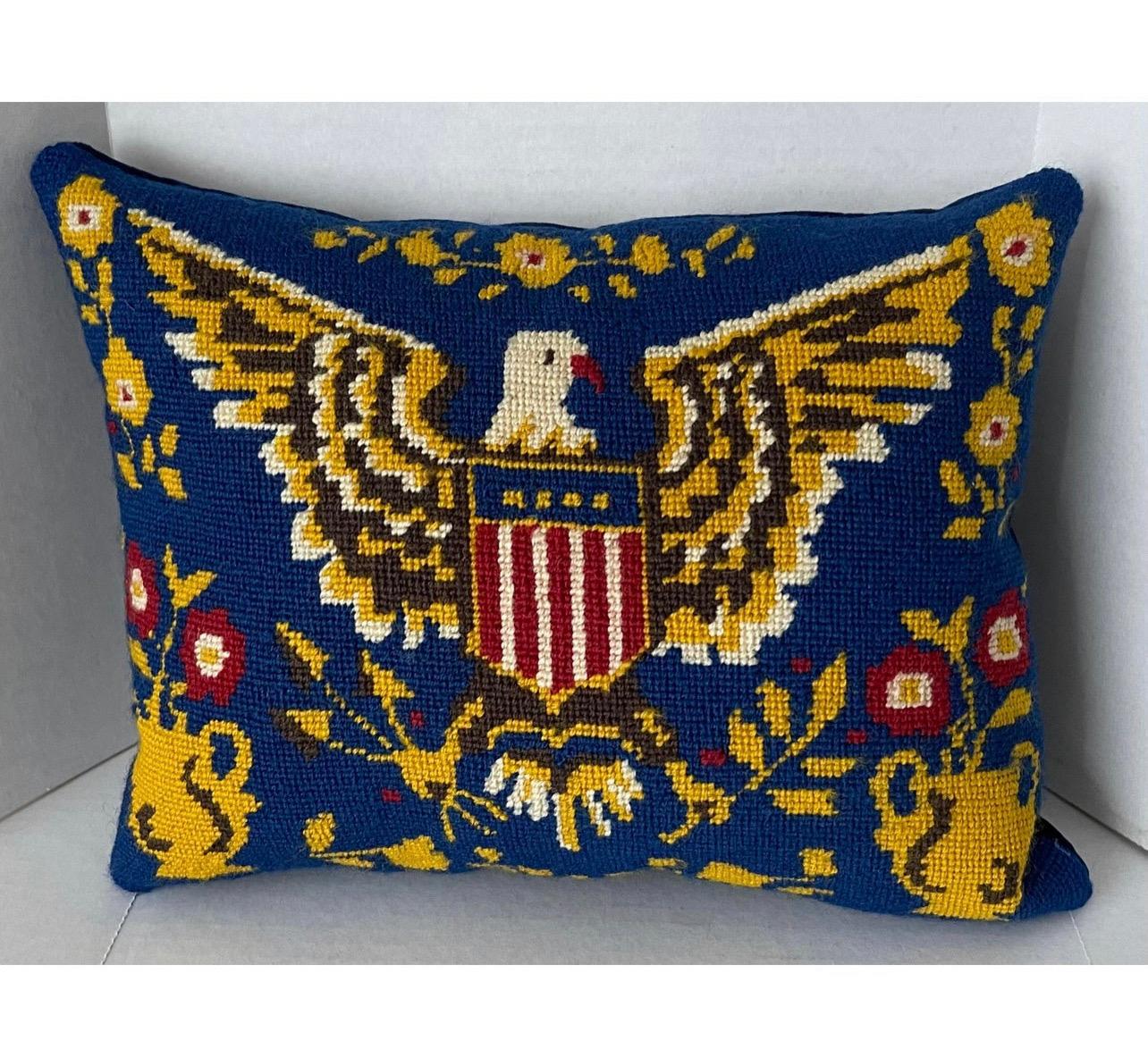 1970s American eagle motif wool needlepoint newly made into custom pillow. Sewn shut style backed in blue velvet. Colors on needlepoint remain bright.