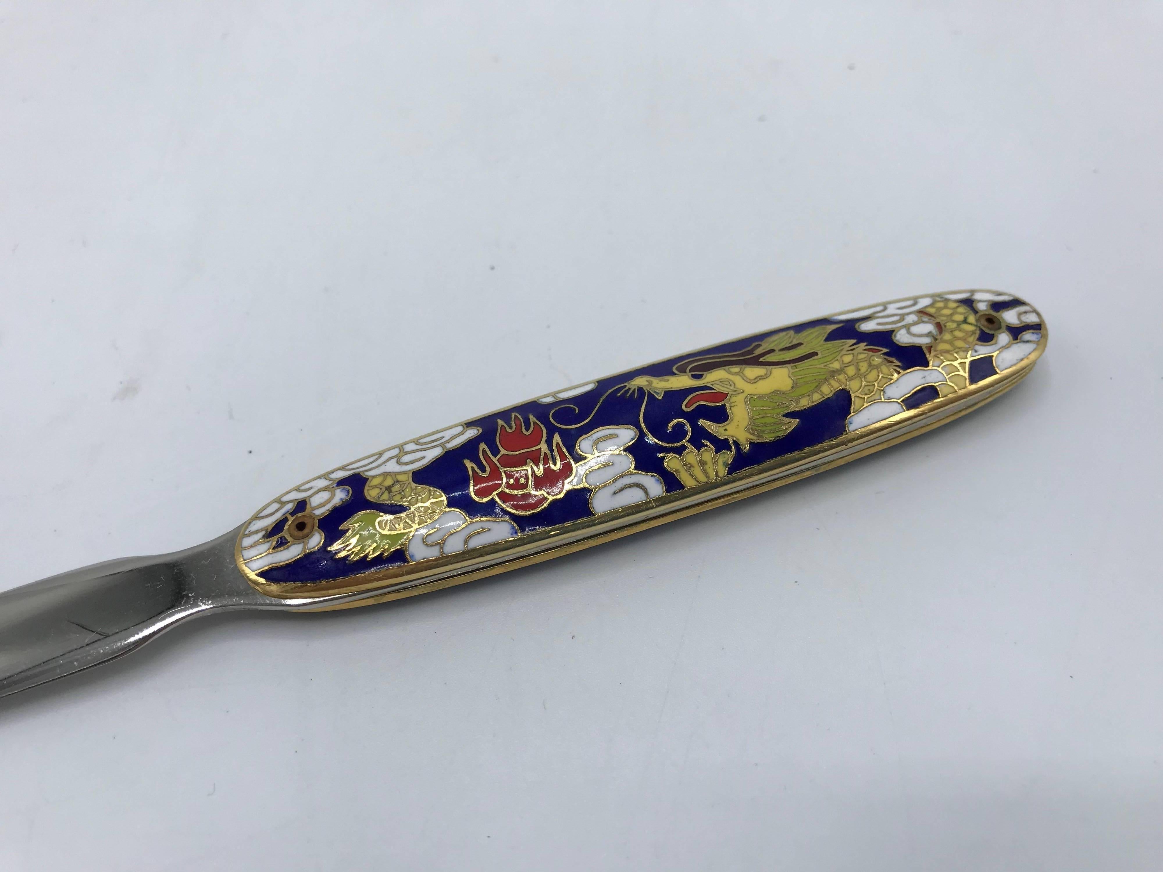Offered is a gorgeous, never used, 1970s blue cloisonné letter opener with a dragon motif. Marked ‘Peking Notel China’ on backside.