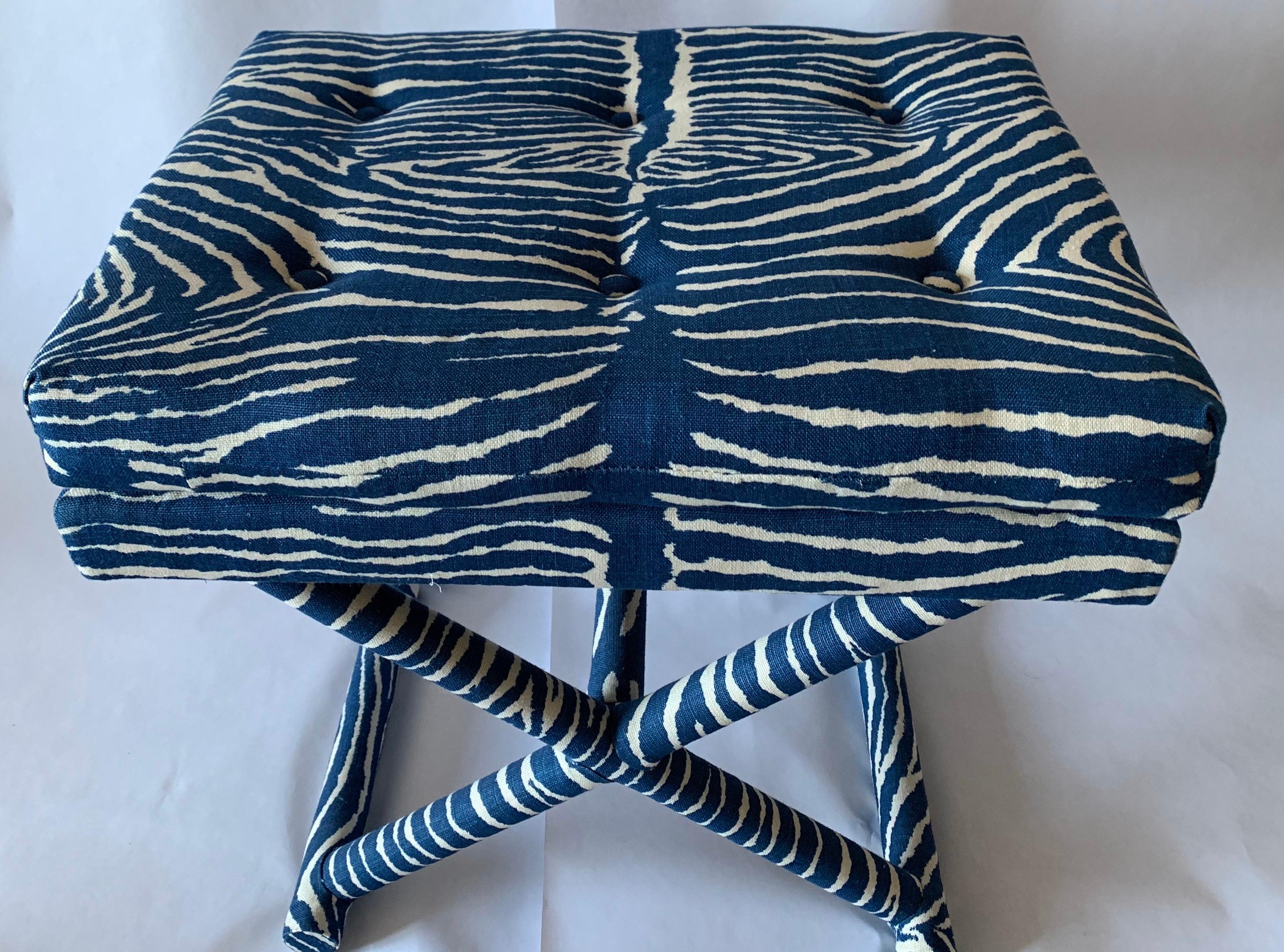 1970s X-bench newly upholstered in Brunschwig & Fils Le Zebre printed linen in blue/ white. Tufted pillow top attached cushion. Fully upholstered design.