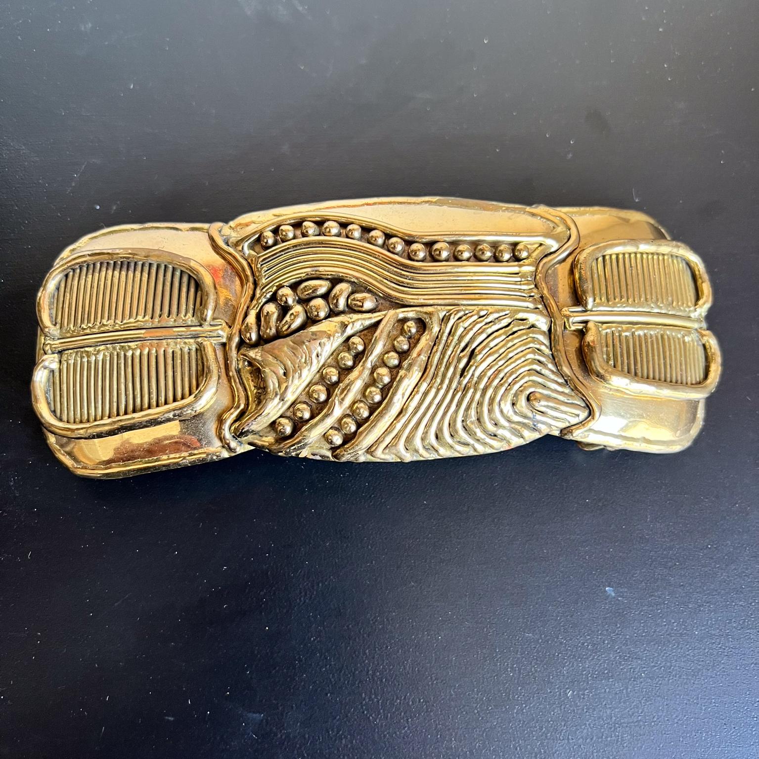 1970s Brass Belt Buckle in the style of Pal Kepenyes
Bohemian Hippie Flair
6.38 w x 2.38 h x .63 d
preowned vintage
Refer to images