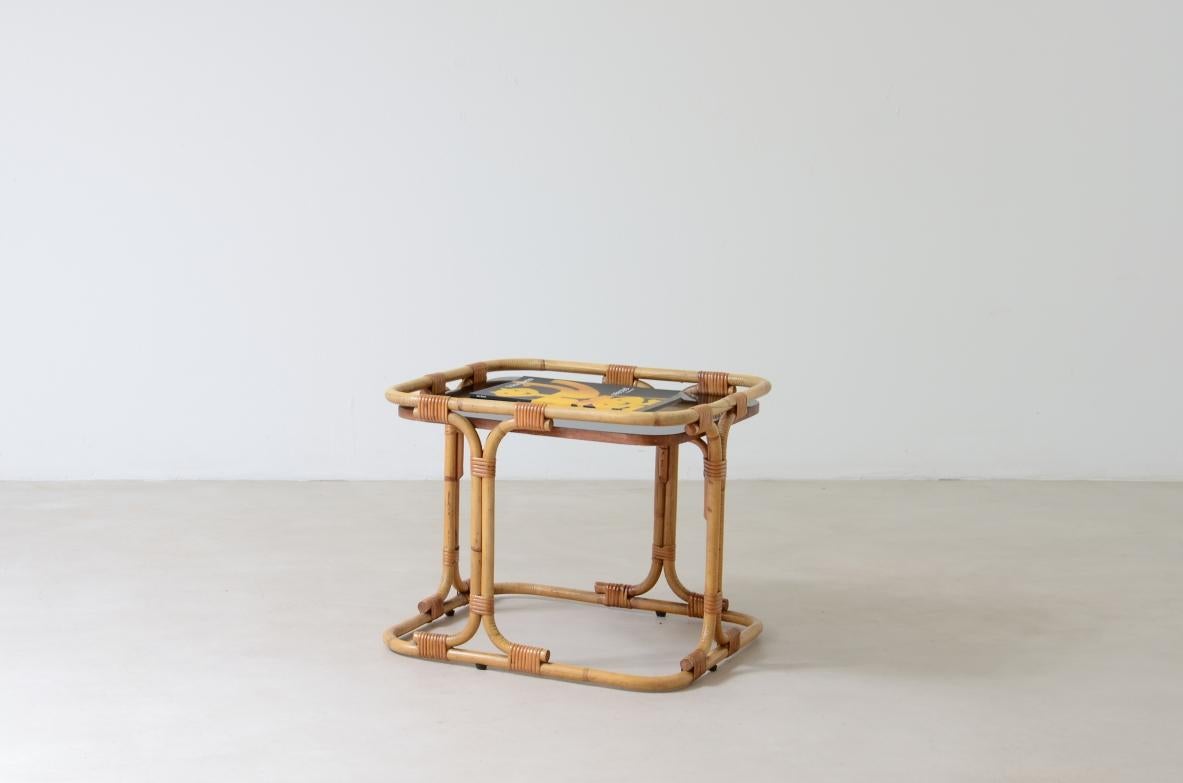 Tito Agnoli (1931-2012)

Kleiner Couchtisch aus Rattan und gebogenem Bambus mit schwarzer Laminatplatte.

Manufaktur Bonacina, ca. 1970.