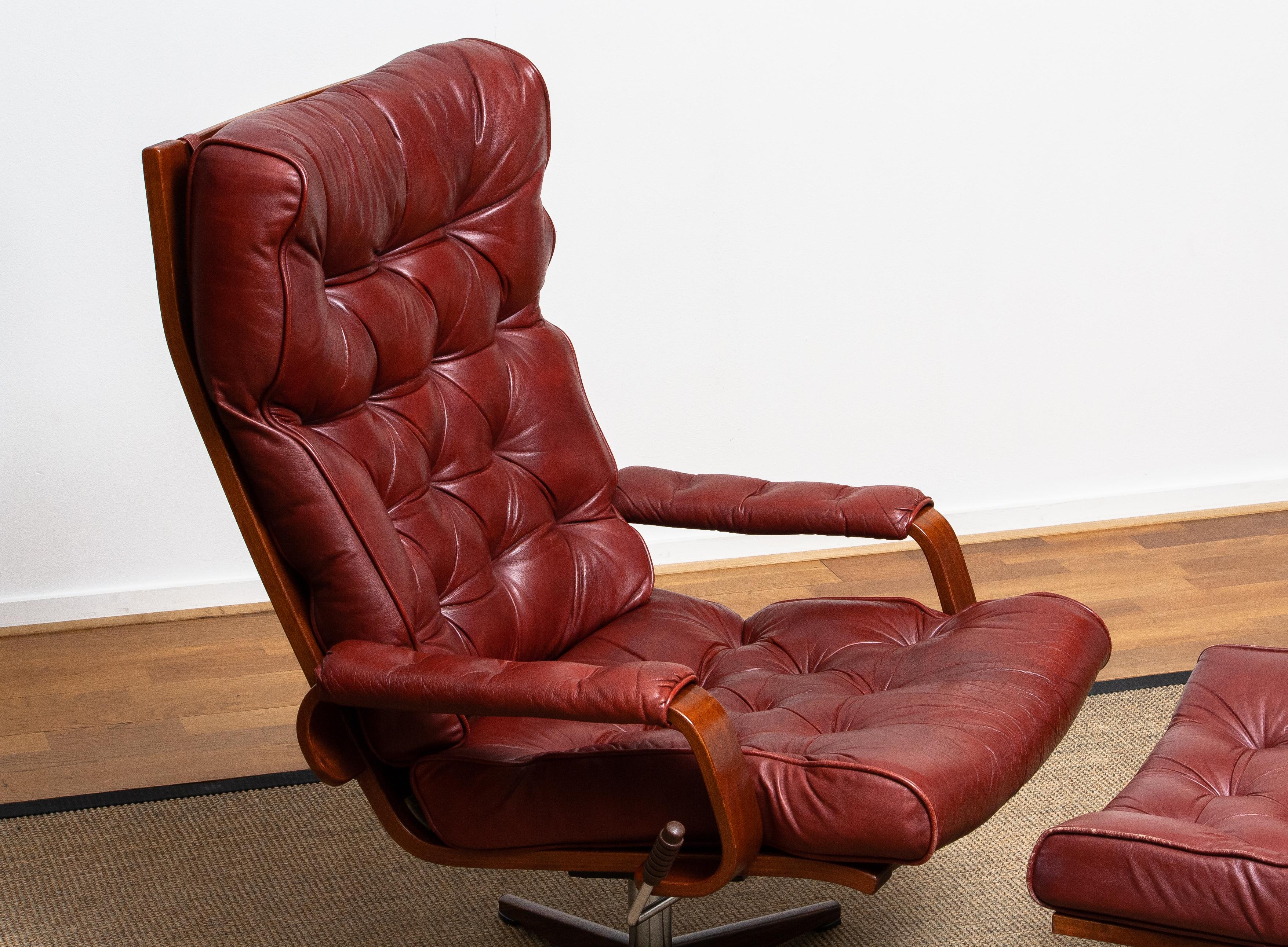 1970s, Bordeaux / Brown Rocking Swivel Lounge / Easy Chair and Ottoman by Kropp 5