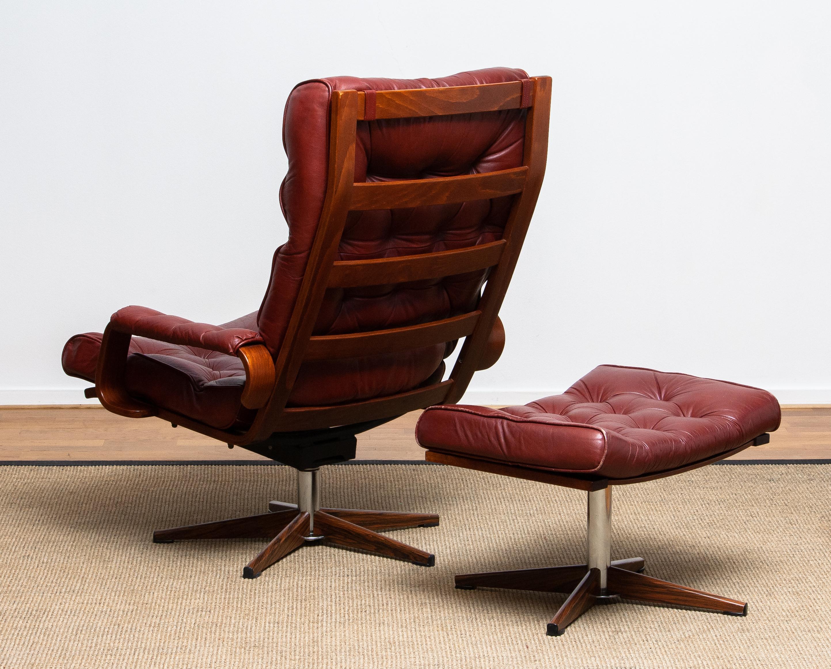 1970s, Bordeaux / Brown Rocking Swivel Lounge / Easy Chair and Ottoman by Kropp 6