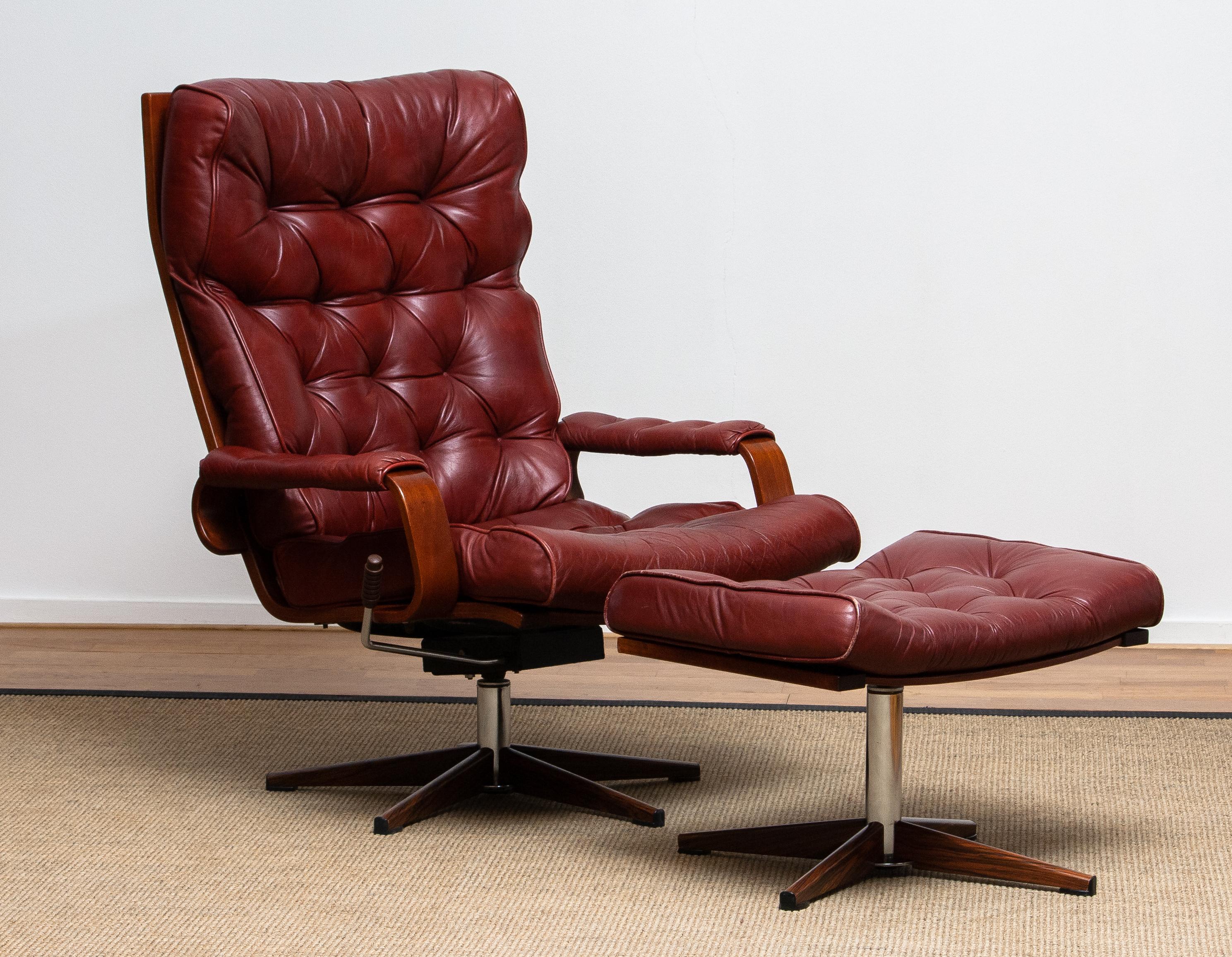 Mid-Century Modern 1970s, Bordeaux / Brown Rocking Swivel Lounge / Easy Chair and Ottoman by Kropp