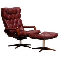 1970s, Bordeaux / Brown Rocking Swivel Lounge / Easy Chair and Ottoman by Kropp