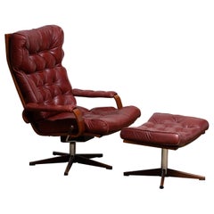 1970s, Bordeaux / Brown Rocking Swivel Lounge / Easy Chair and Ottoman by Kropp