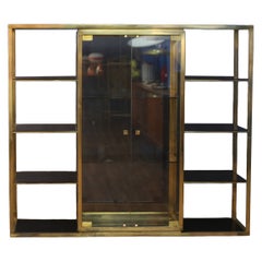 1970er Bücherregal aus Messing und Glas von Romeo Rega