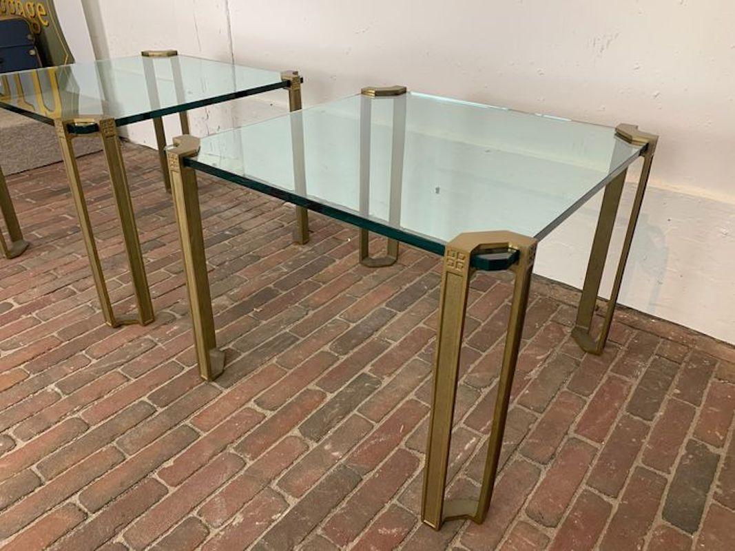 Coffee Table designed by Peter Ghyczy in the 1970s. Solid cast brass legs with a thick 15 mm glass top slid in. The glass top measures 60 cm x 60 cm. Total width/length is 62 x 62 cm. Height is 45 cm. In excellent, vintage condition. The glass is