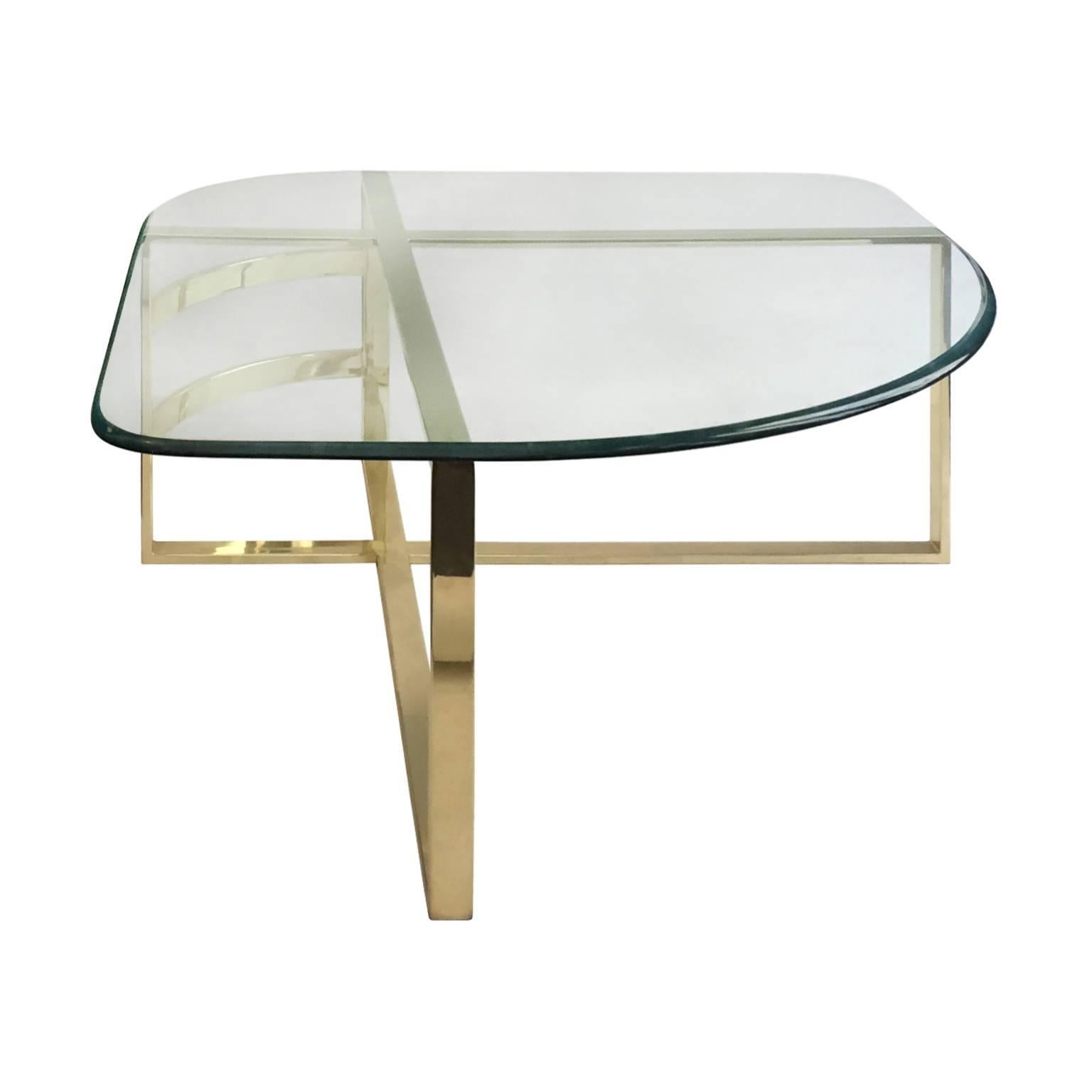 1970s Brass Coffee Table with Rounded Triangular Glass Top For Sale