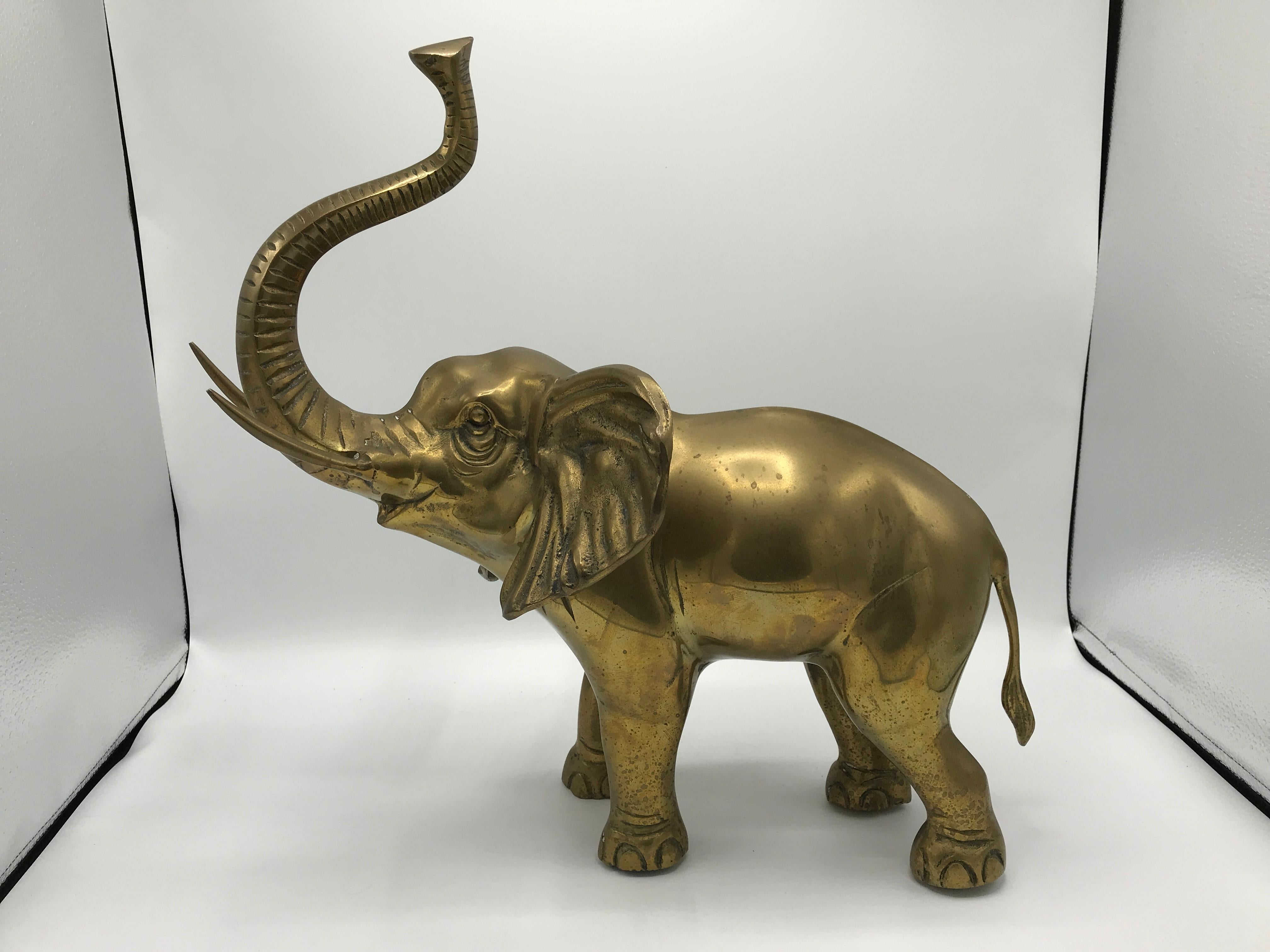 Offered is a beautiful, large, 1970s brass elephant sculpture. This heavily detailed piece is perfect for any brass collector! Heavy, weighing 8.5lbs.