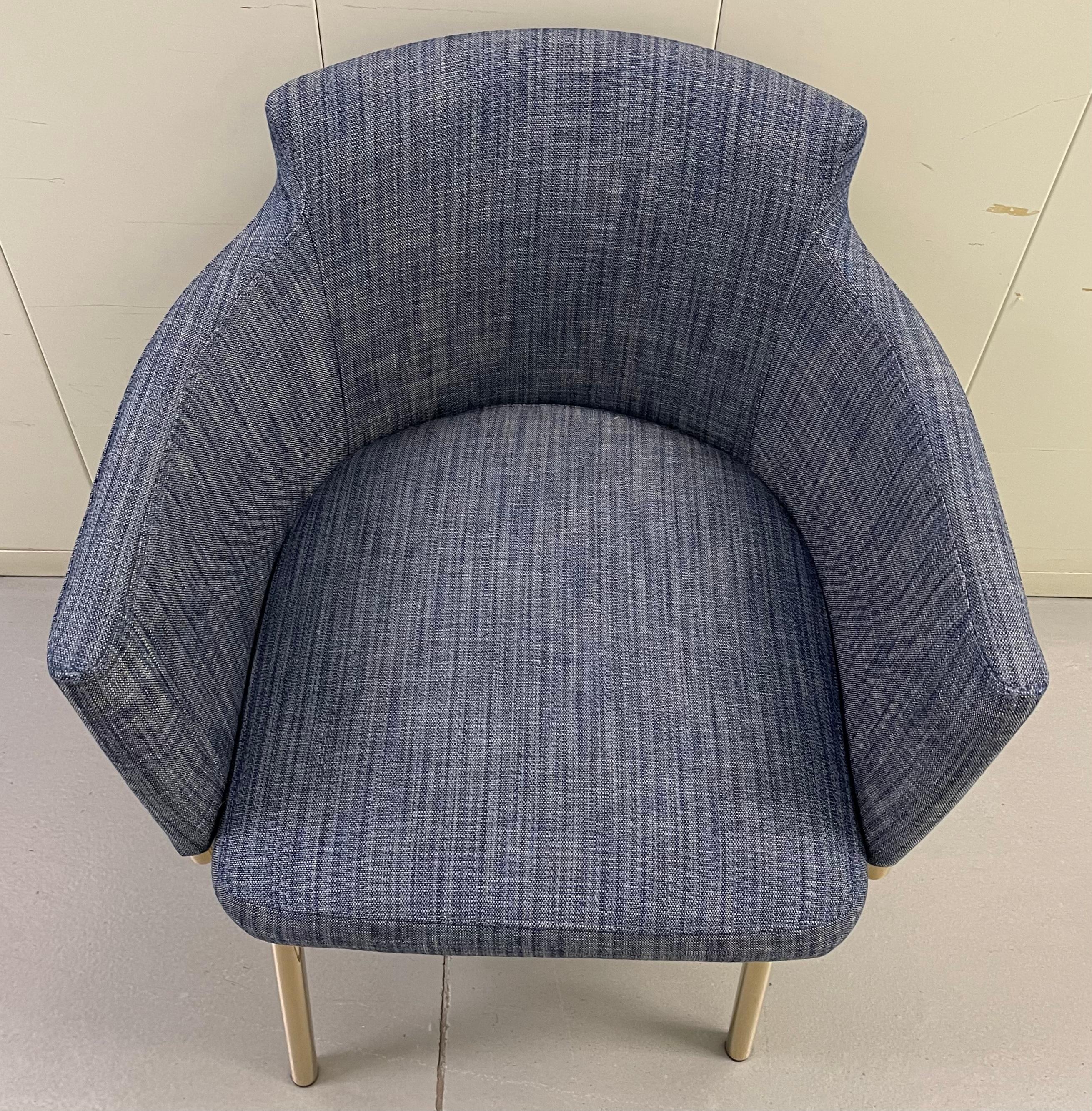 1970s polished brass swivel desk or vanity chair. Curved back detailing. Newly upholstered in Perennials performance woven fabric in dark blue colorway. Suitable for high traffic areas. 
Measures: Seat is 18