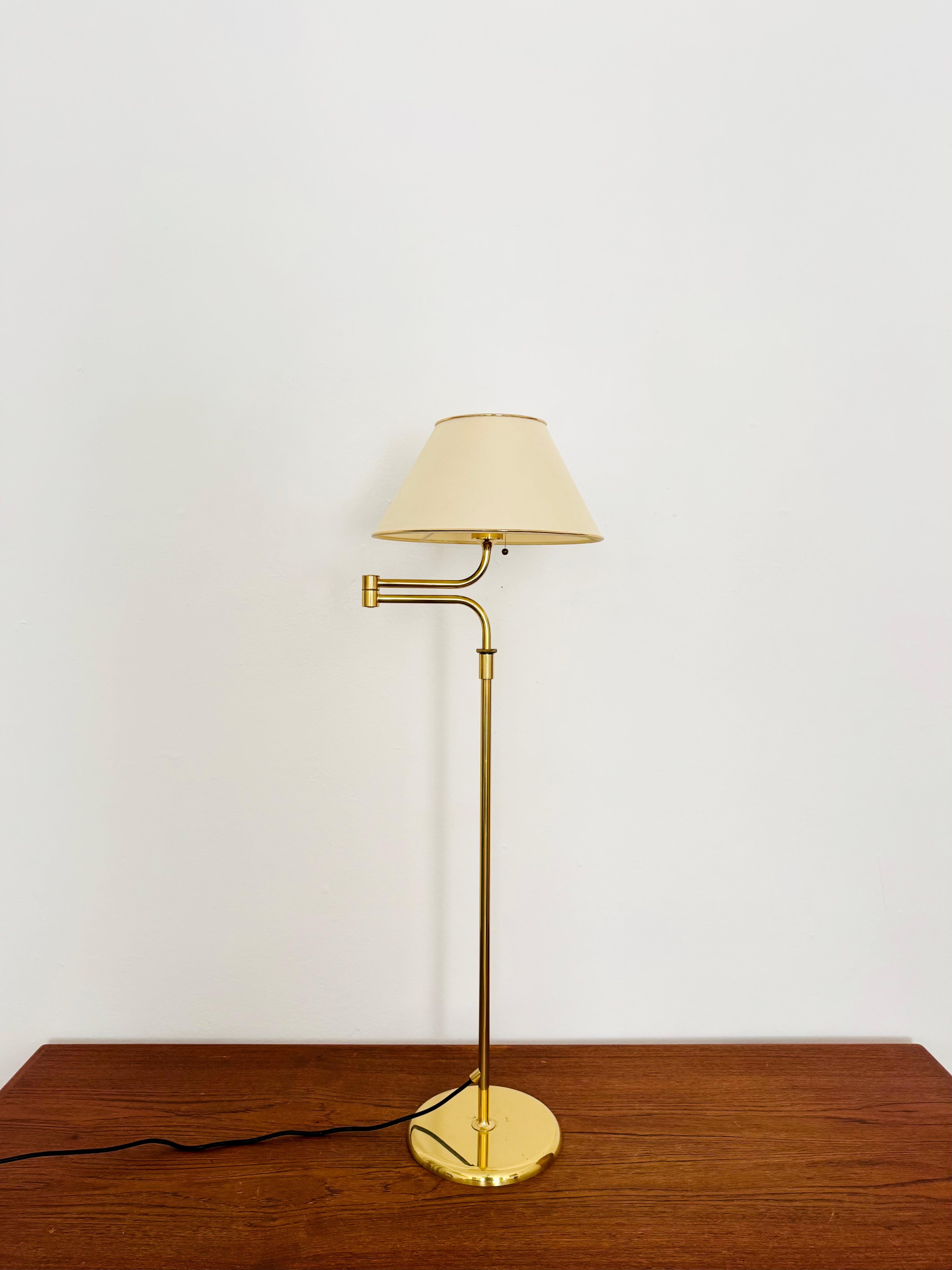 A very beautiful, height-adjustable brass floor lamp from the 1970s.
The design and the beautiful details create a very elegant and pleasant light.
The lamp creates a very cozy atmosphere and is of very high quality.
Continuously