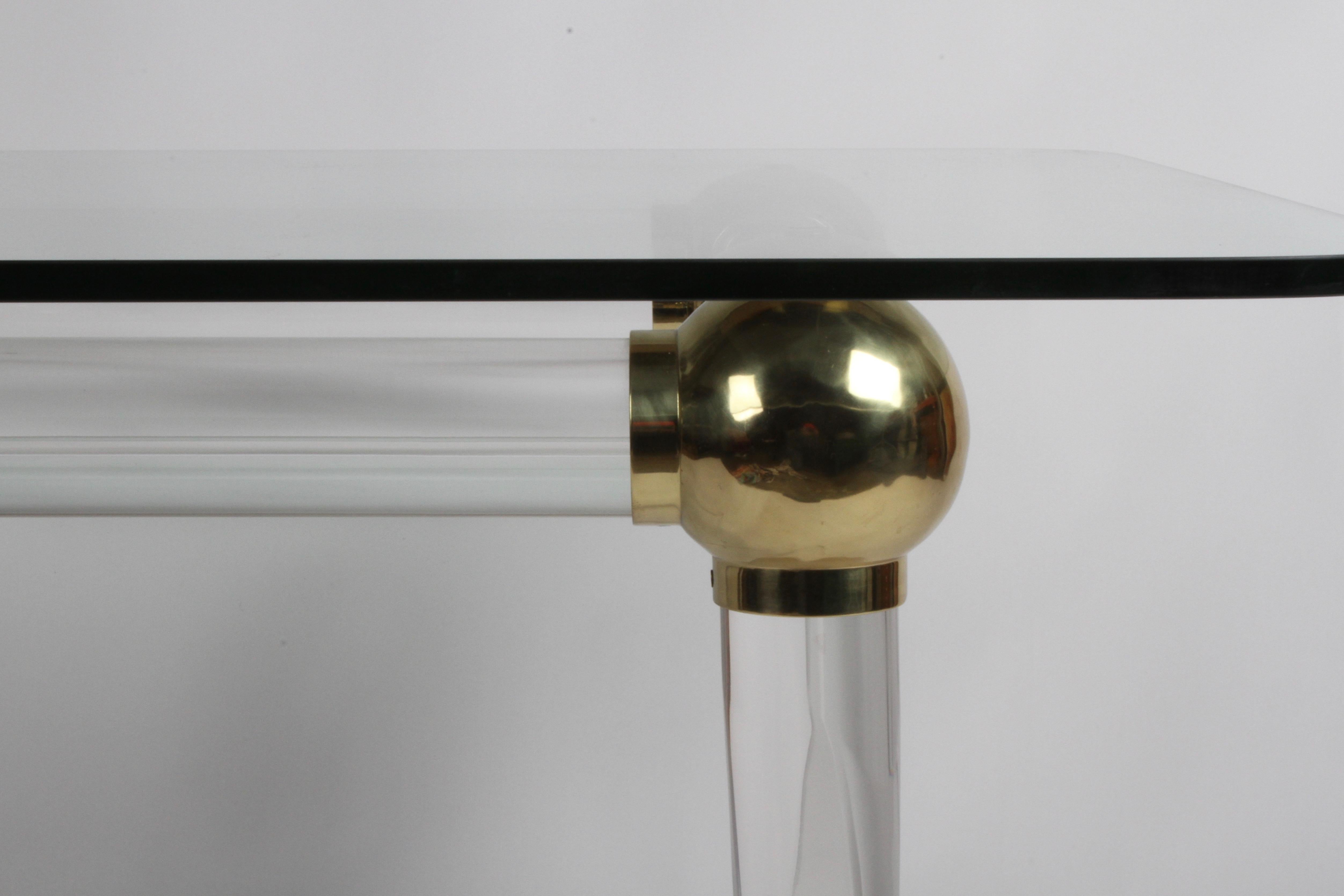 American 1970s Brass and Lucite Game Table with Glass Top, Four Brass Balls on Saber Legs For Sale