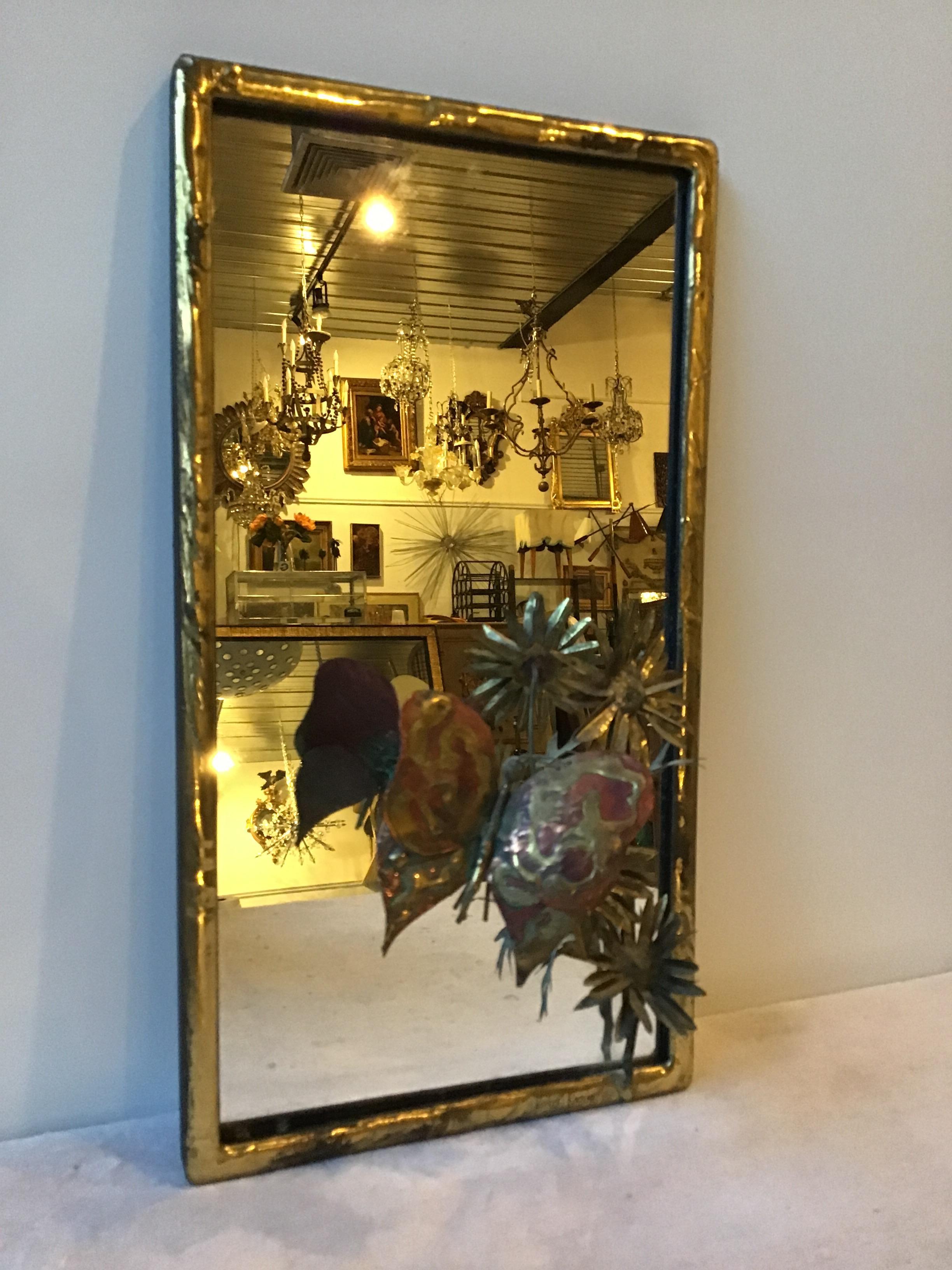 1970s brass-plated mirror with butterfly and flower sculpture .
Signed Nober Roosnr.
