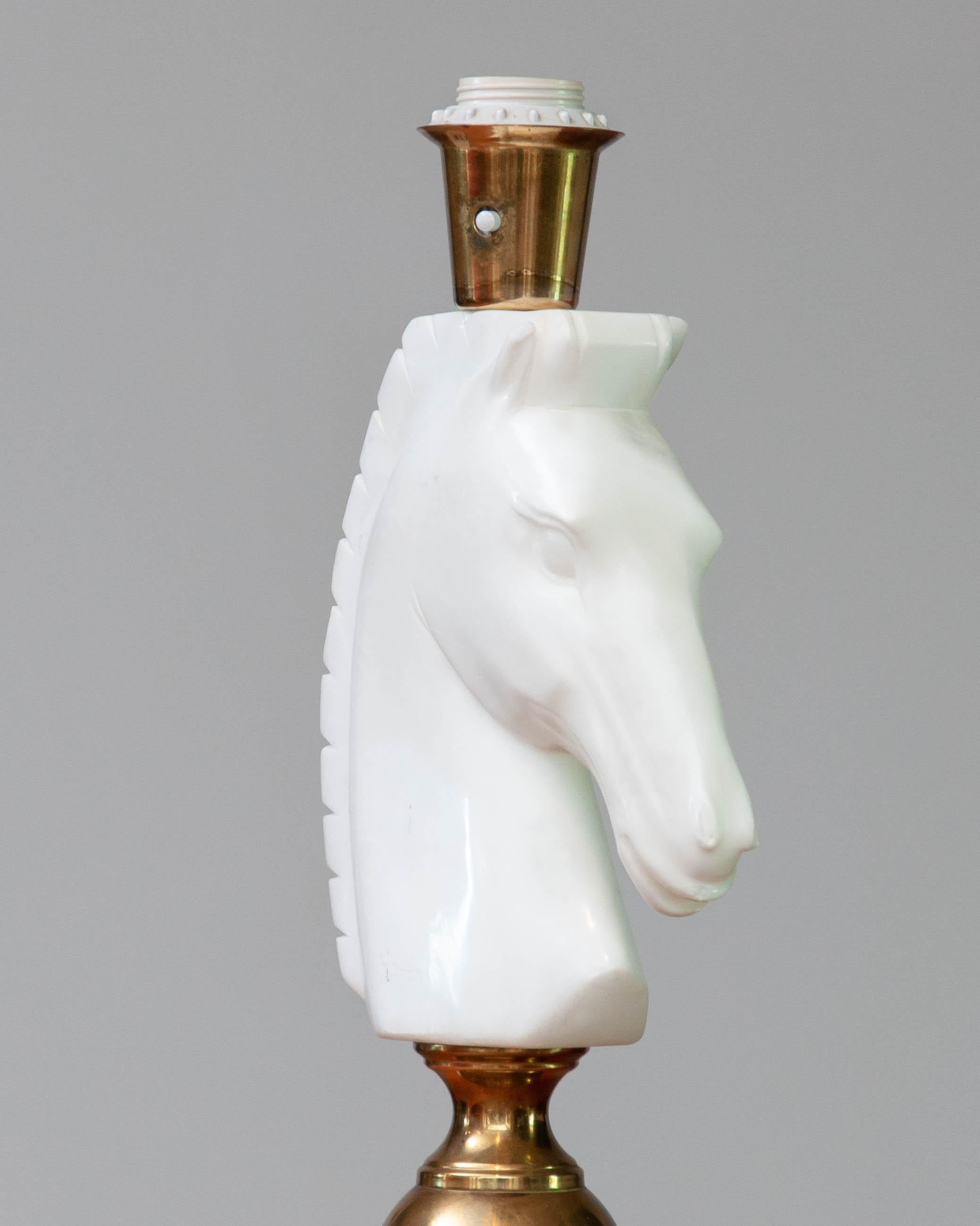 Beautiful and absolutely rare table lamp in brass and beautiful hand cut Italian alabaster horse head. This masterpieces combined with a great shade wil absolutely create a fabulous ambiance into your house.
Technically the lamp are in good