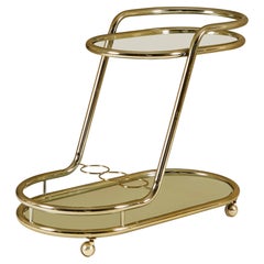 1970s Brass Tubular Drinks Trolley, mirrored shelf with 3 bottle holder