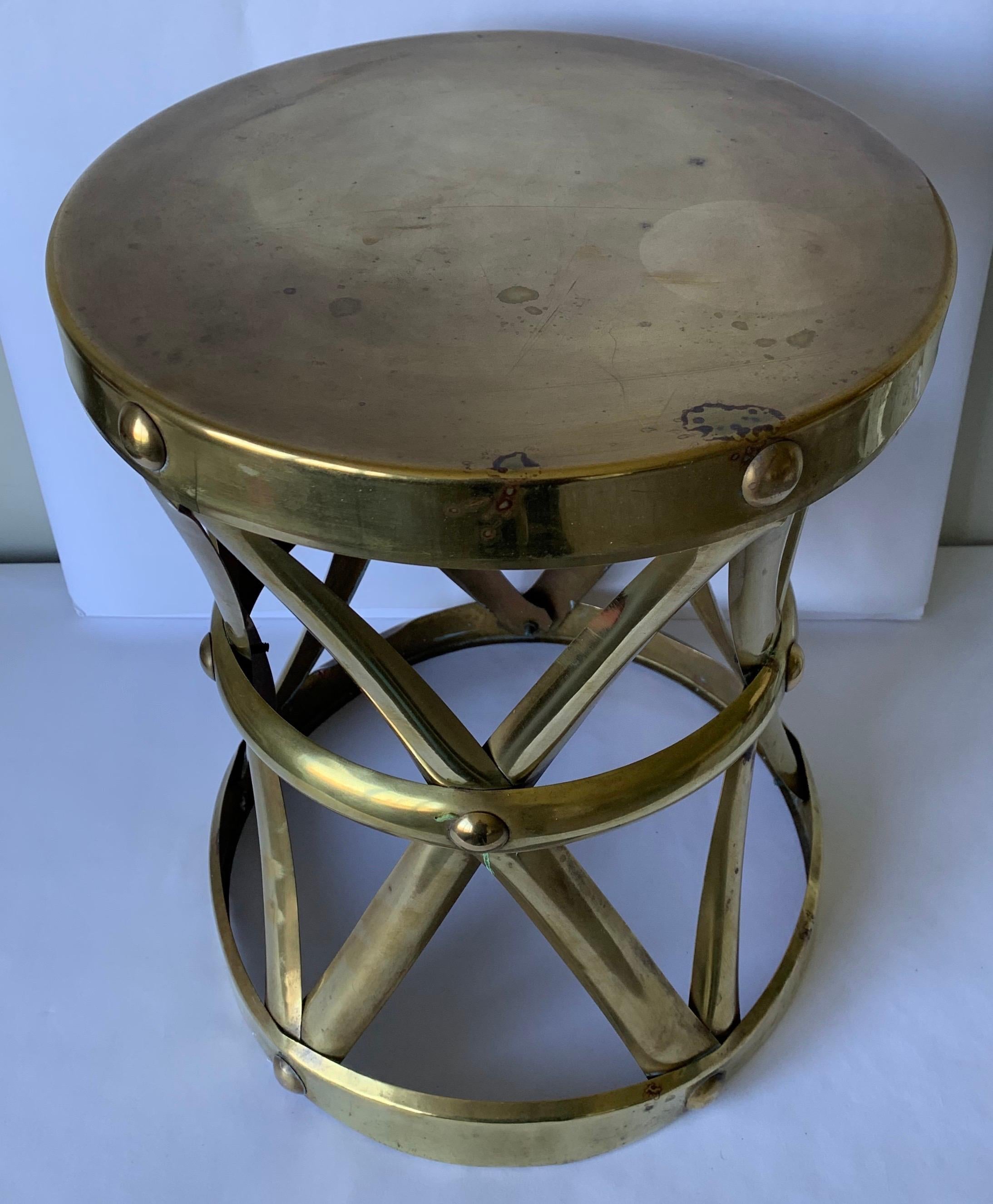 1970s brass tabourert X-frame stool. Original brass finish with overall unpolished patina.
