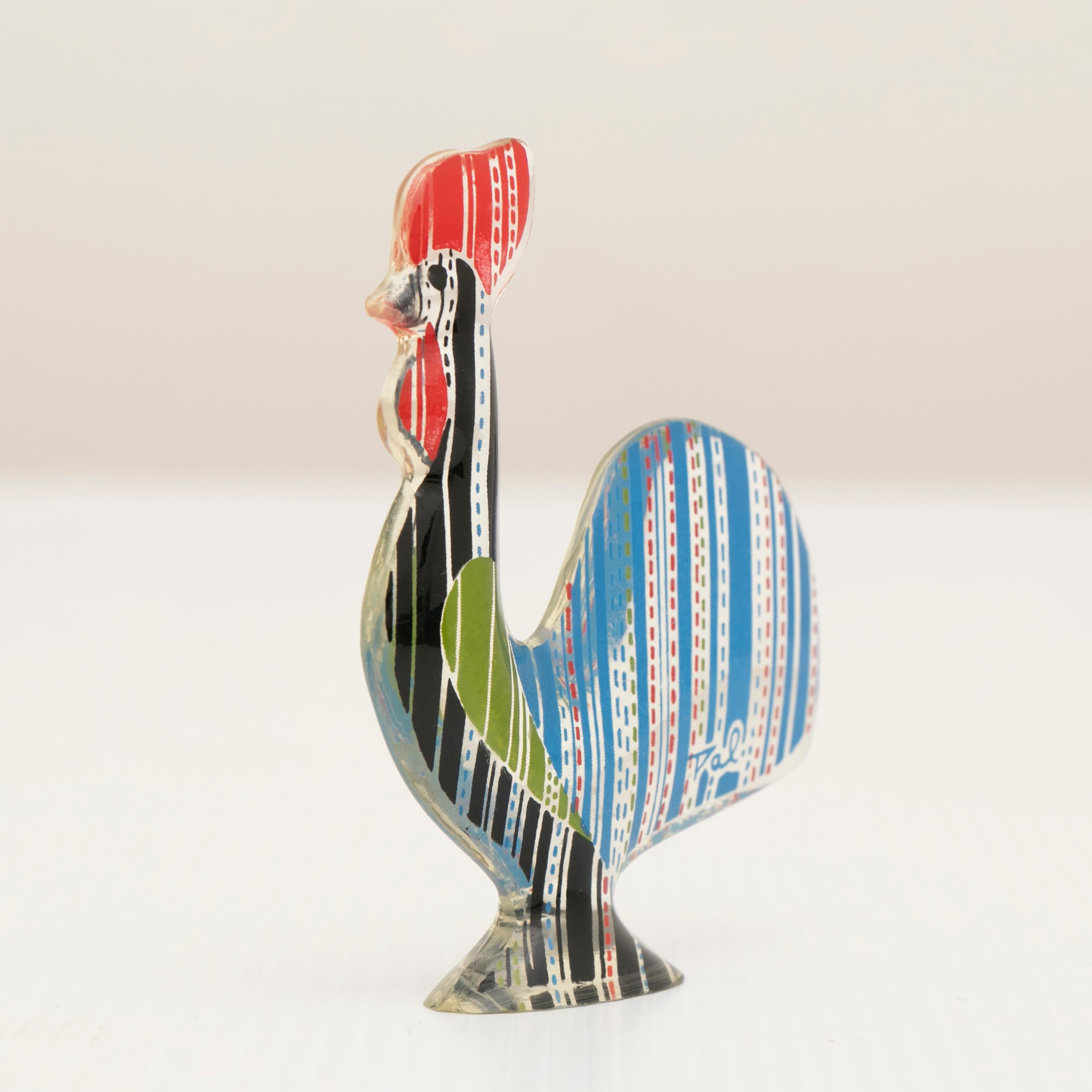 1970s acrylic multicolored cockerel by Brazilian artist Abraham Palatnik. An op art design with Kinetic lines throughout and signed on the lower back by the artist.

This vintage item is in excellent condition with no chips, cracks and minimal