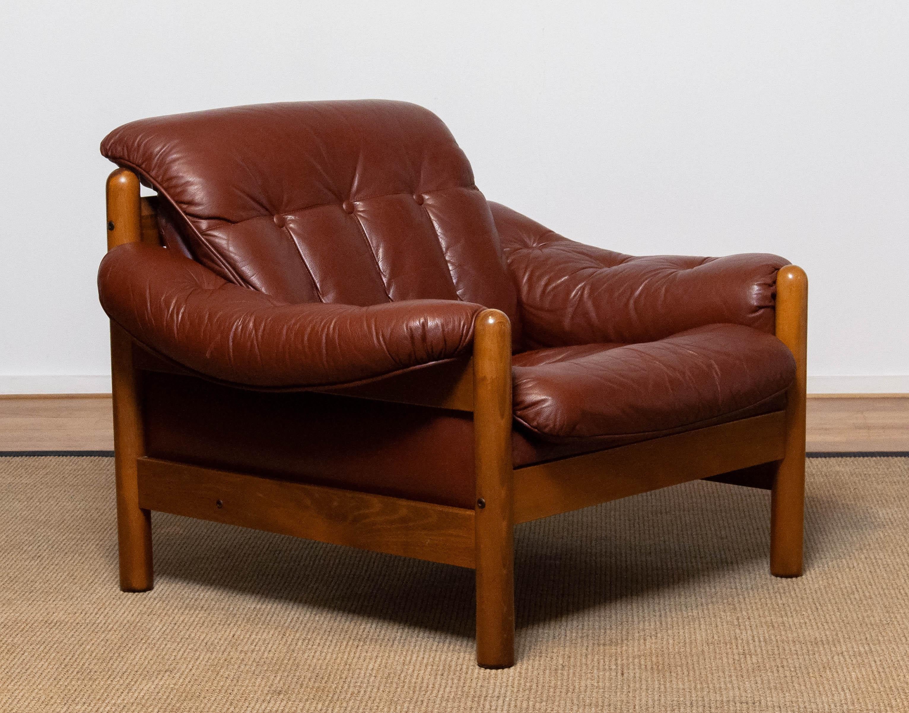 Beautiful Brutalist / Brazilian style lounge chair made by Göte Möbler Nässjö in Sweden in brown leather. The wooden construction is made of beech. Sits absolutely very comfortable even for a longer period. Allover in very good condition.
Please