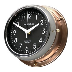 1970s British Bronze AC.GMT.Co. Industrial Wall Clock Chrome Bezel Black Dial