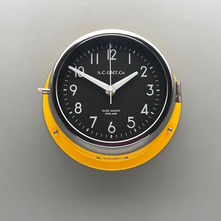 Quartz sweep seconds / non ticking wall clock finished in Yellow Pantone 13-0647 Illuminating.

Rescued from Industrial scrap yards and brought back to life in our UK workshop, our expert process allows us to create a high quality clock of luxury