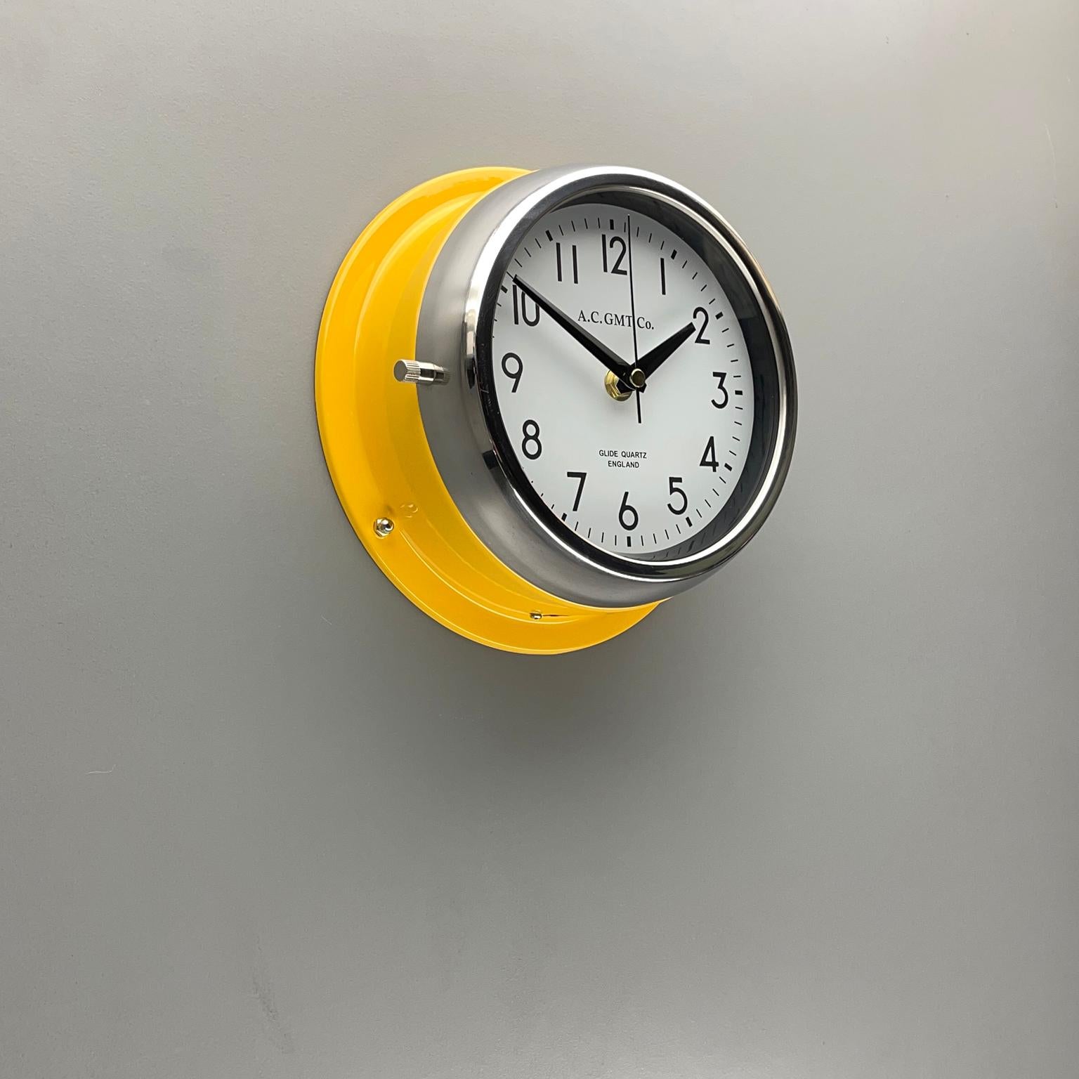 Industrial 1970's British Yellow Illumination & White AC GMT Co. Classic Quartz Wall Clock