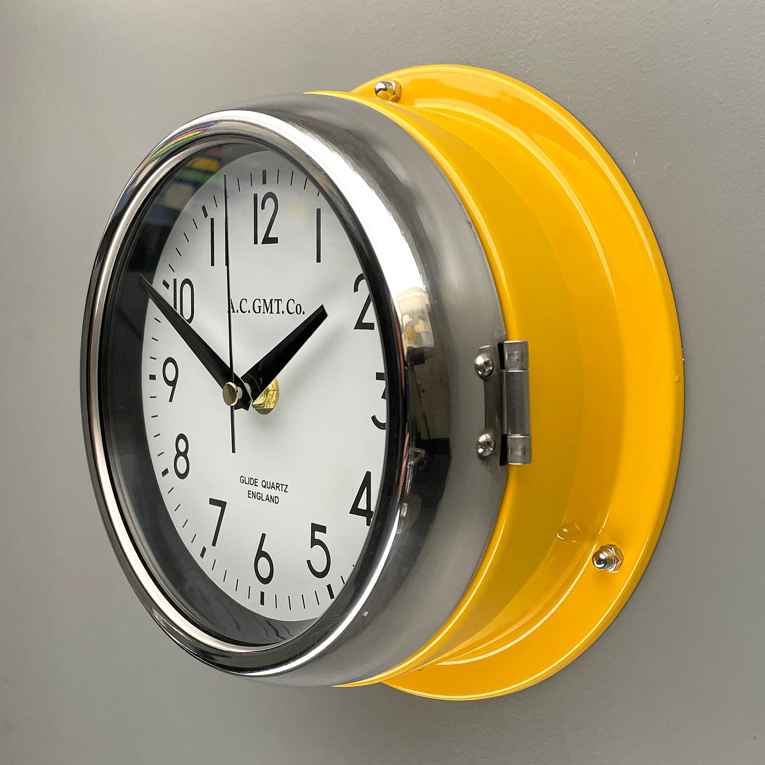 Glazed 1970's British Yellow Illumination & White AC GMT Co. Classic Quartz Wall Clock